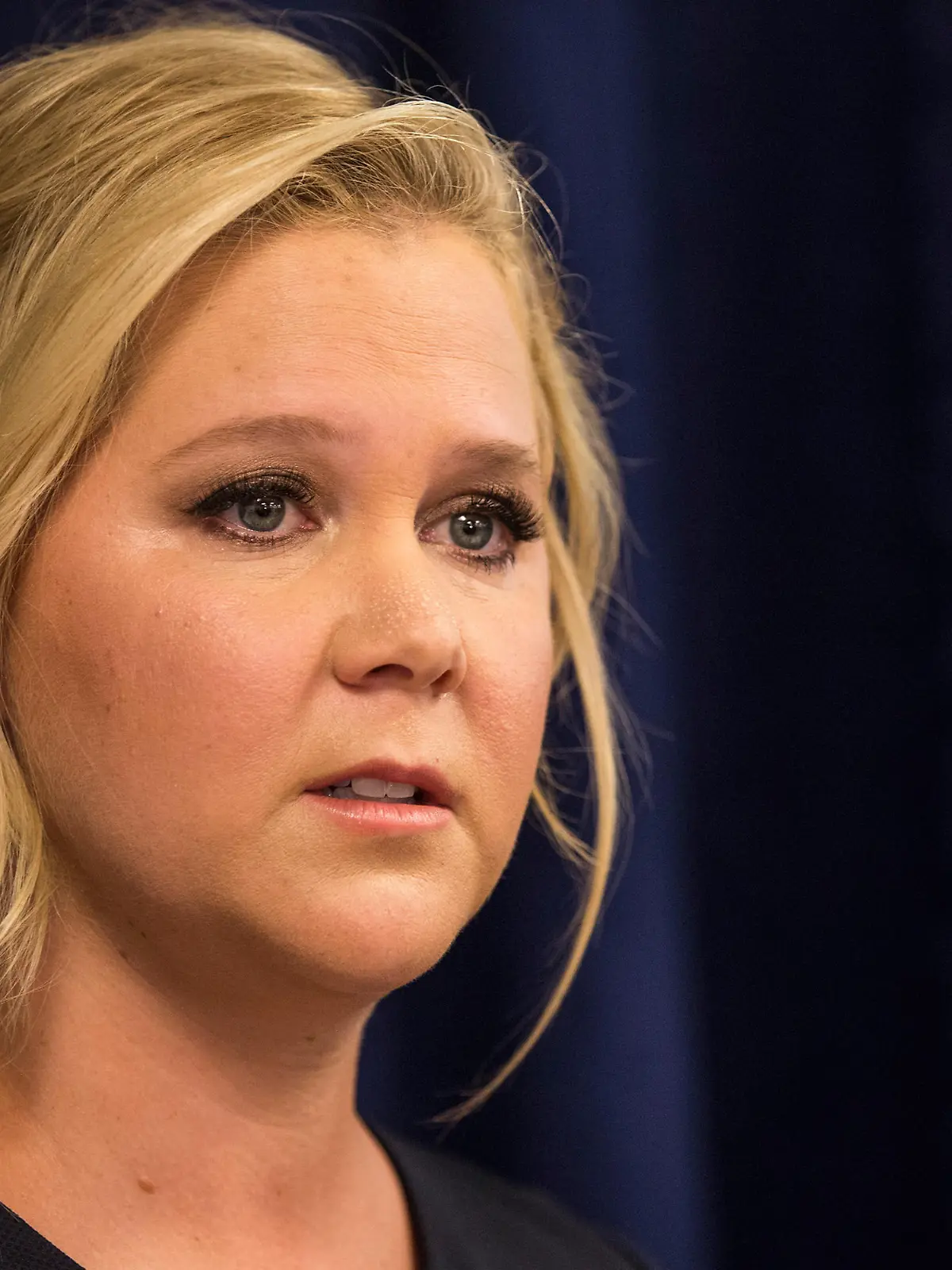 NEW YORK, NY - AUGUST 03:  Comedian Amy Schumer speaks at a press conference with U.S. Senator Chuck Schumer (D-NY) calling for tighter gun laws in an effort to stop mass shootings and gun violence on August 3, 2015 in New York City. A gunman killed two women last month in Louisiana during a showing of Schumer's movie 'Trainwreck.'  (Photo by Andrew Burton/Getty Images)