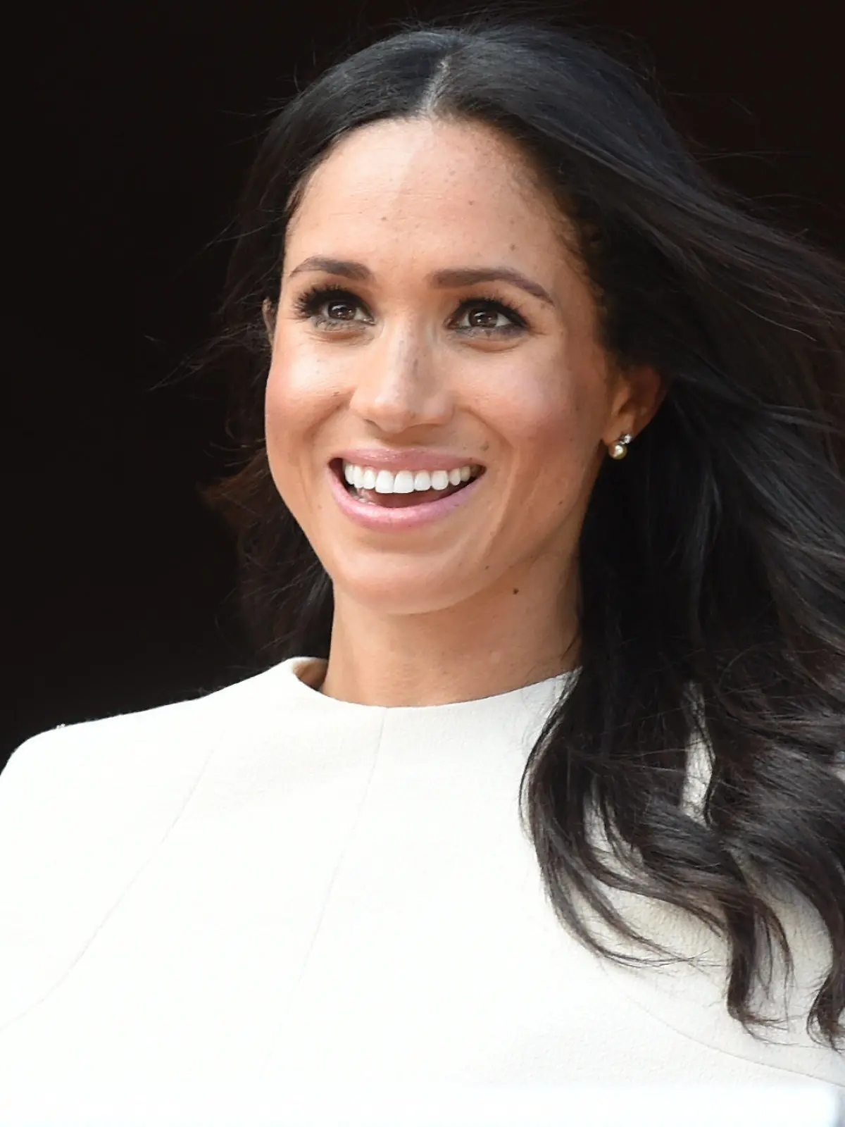 14.06.2018, Großbritannien, Cheshire, Chester: Herzogin Meghan bei ihrem Besuch. Es ist der erste öffentliche Auftritt von Herzogin Meghan gemeinsam mit der Königin. Foto: Eddie Mulholland/The Telegraph Pool/AP/dpa +++ dpa-Bildfunk +++