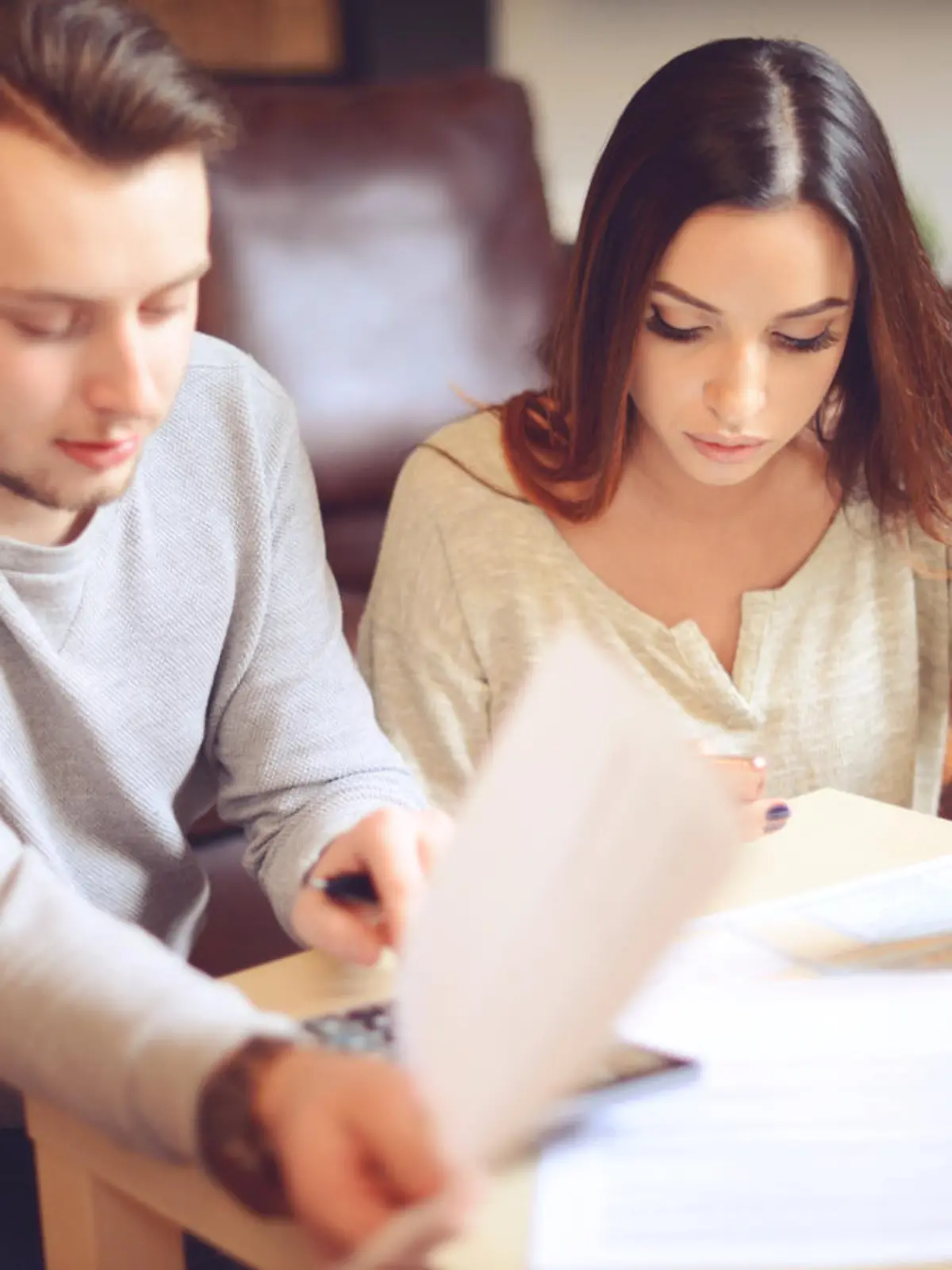 Young beautiful couple in home interior