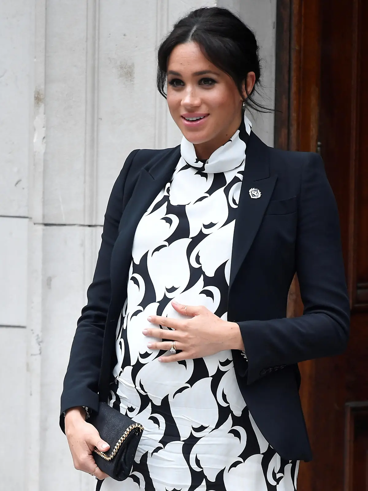 FILE PHOTO: Britain's Meghan, Duchess of Sussex, leaves after an International Women's Day panel discussion at King's College London, in London, Britain, March 8, 2019. REUTERS/Toby Melville/File Photo