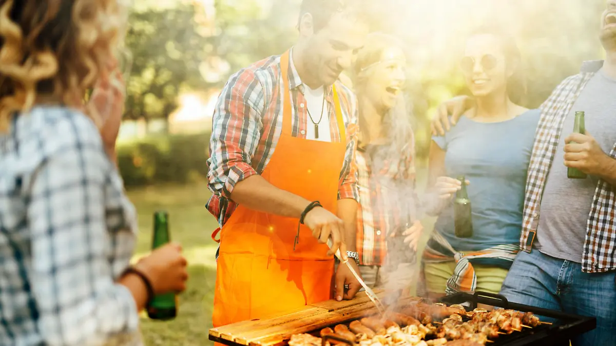 Young people enjoying barbecuing