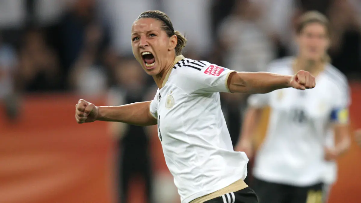 Inka Grings of Germany celebrates after scoring the 3-2 through penalty during the Group D match France against Germany of FIFA Women's World Cup soccer tournament at the Borussia Park Stadium in Moenchengladbach, Germany, 5 July 2011. Photo: Rolf Vennenbernd dpa/lnw +++(c) dpa - Bildfunk+++