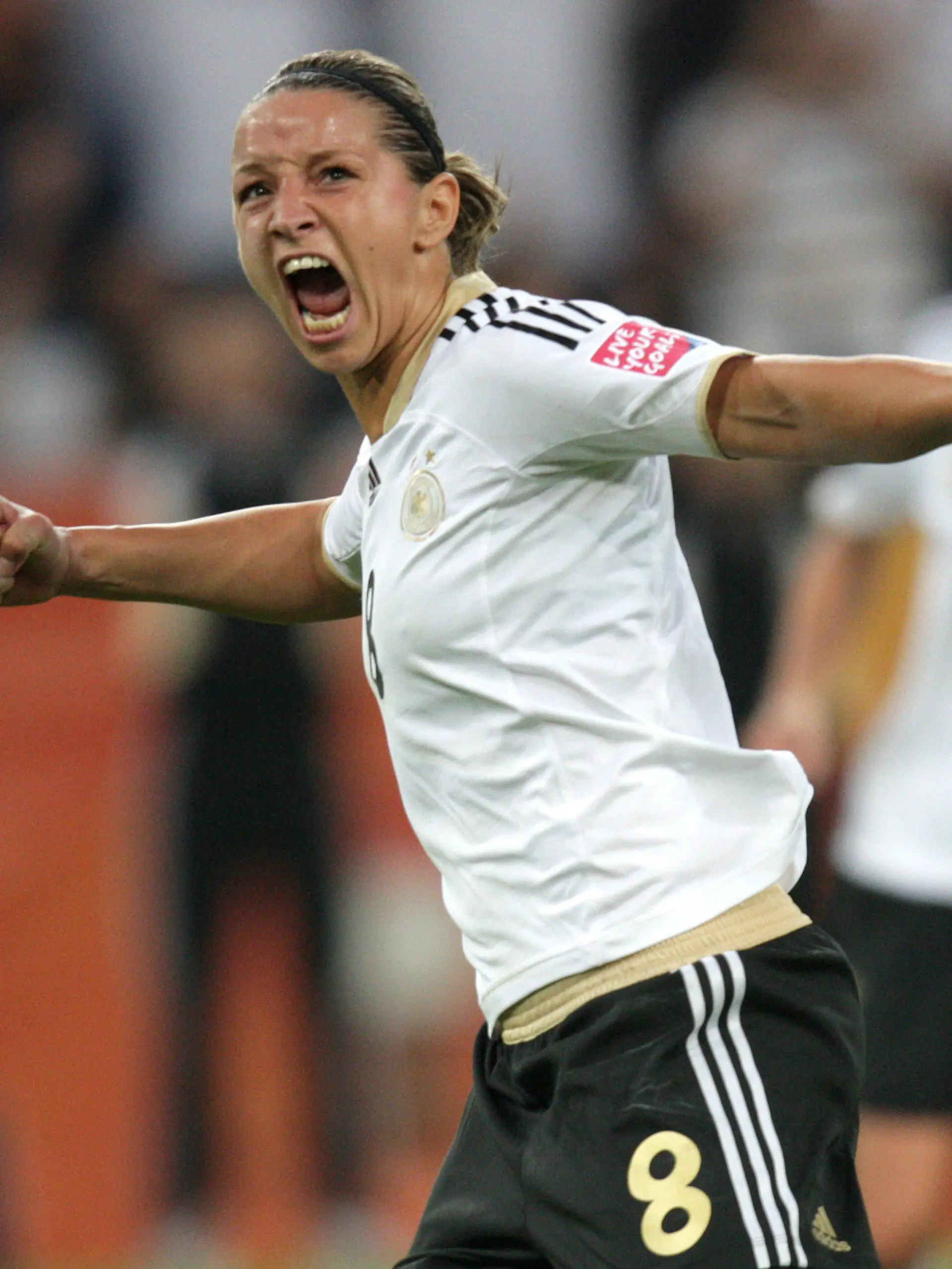 Inka Grings of Germany celebrates after scoring the 3-2 through penalty during the Group D match France against Germany of FIFA Women's World Cup soccer tournament at the Borussia Park Stadium in Moenchengladbach, Germany, 5 July 2011. Photo: Rolf Vennenbernd dpa/lnw +++(c) dpa - Bildfunk+++