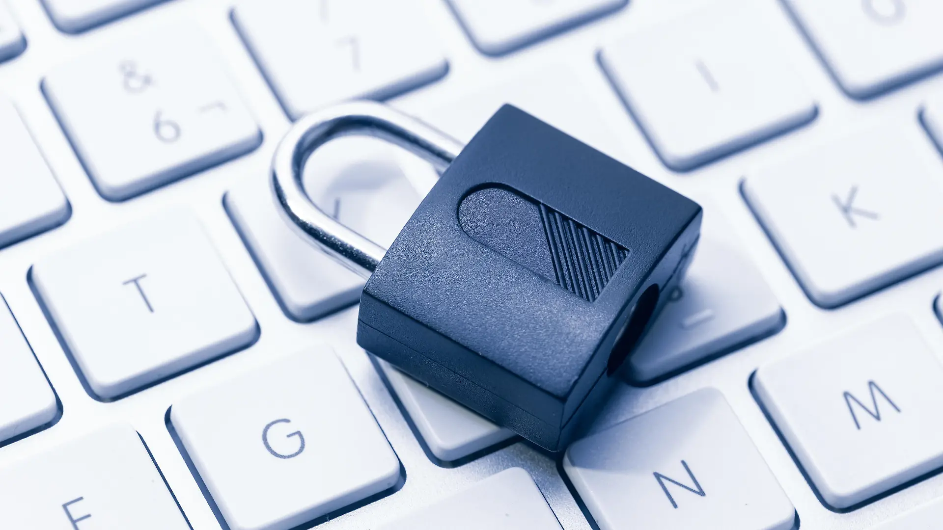 Computer Security and data privacy concept. Closed padlock on computer keyboard