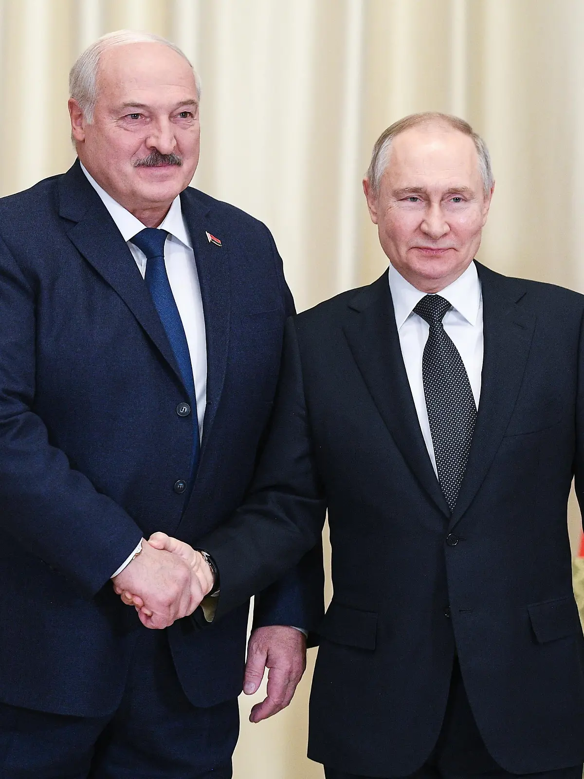 RUSSIA, NOVO-OGARYOVO - FEBRUARY 17, 2023: Belarusian President Alexander Lukashenko (L) and Russia's President Vladimir Putin shake hands as they pose for a photograph during a meeting in the Novo-Ogaryovo residence. Vladimir Astapkovich/POOL/TASS / action press