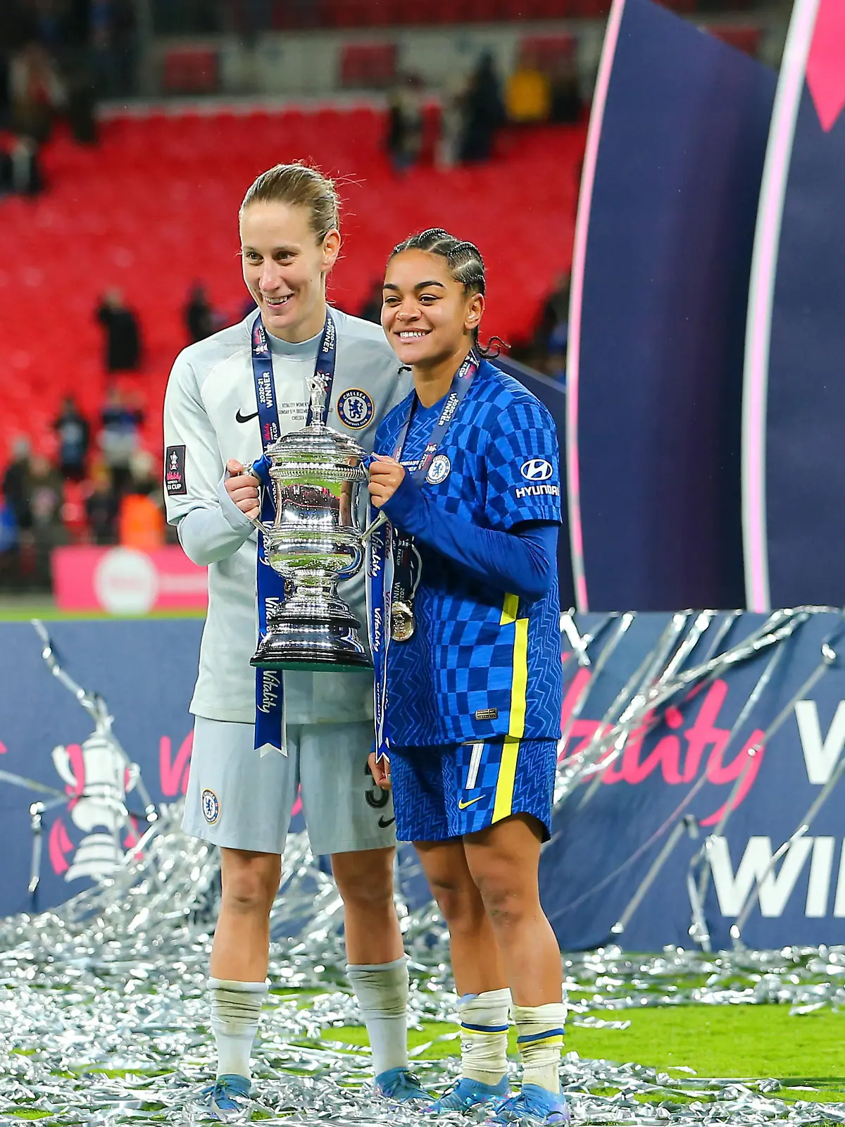 5th December 2021; Wembley Stadium, London, England; Womens FA Cup final, Arsenal versus Chelsea: Ann Katrin Berger and Jessica Carter of Chelsea Women posing with the Womens FA Cup trophy.