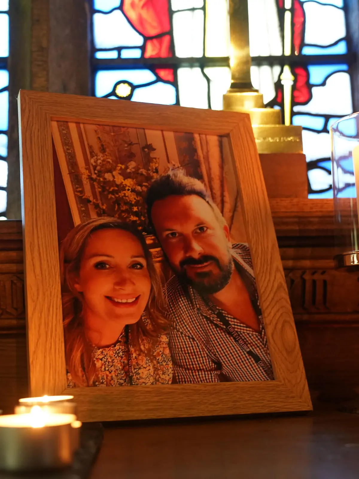 Nicola Bulley missing. Candles are lit around a photo of Nicola Bulley (left) and her partner Paul Ansell on an altar at St Michael's Church in St Michael's on Wyre, Lancashire, as police continue their search for missing woman Nicola Bulley, 45, who was last seen two weeks ago on the morning of Friday January 27, when she was spotted walking her dog on a footpath by the nearby River Wyre. Picture date: Friday February 10, 2023. See PA story POLICE Bulley. Photo credit should read: Owen Humphreys/PA Wire URN:70935886