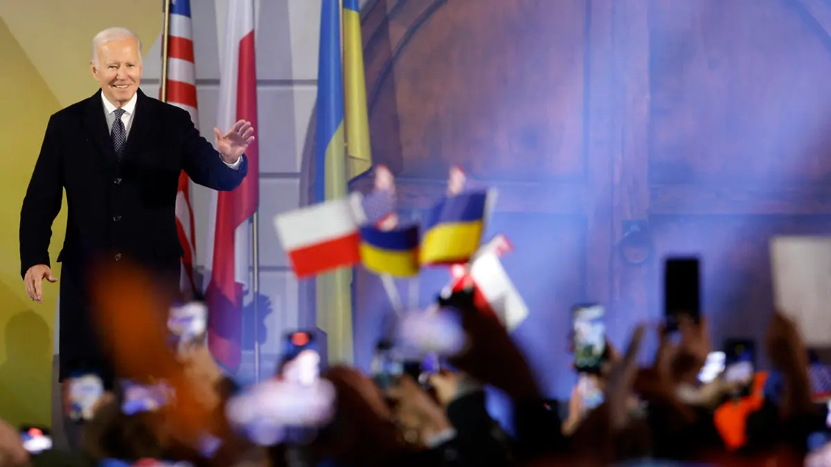 President Joe Biden waves as he arrives to hold a speech at the Royal Castle after meeting with Polish President Andrzej Duda in Warsaw, Poland, Tuesday, Feb. 21, 2023. (AP Photo/Michal Dyjuk)