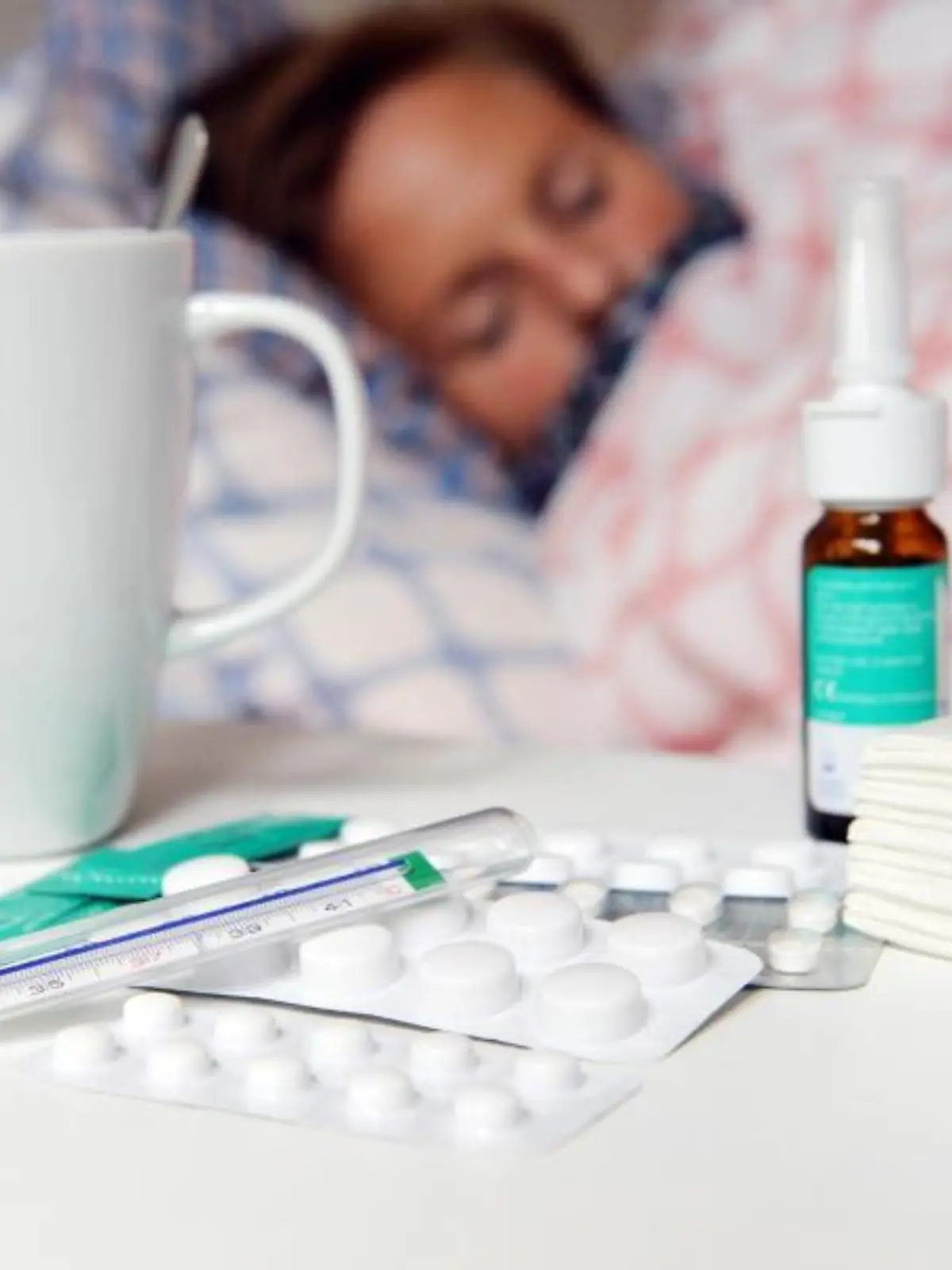 Grippe-Patientin im Bett