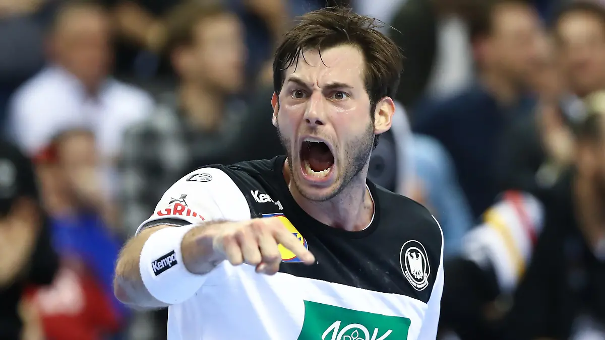 BERLIN, GERMANY - JANUARY 15: Uwe Gensheimer of Germany celebrates during the 26th IHF Men's World Championship group A match between Germany and France at Mercedes-Benz Arena on January 15, 2019 in Berlin, Germany. (Photo by Martin Rose/Bongarts/Getty Images)