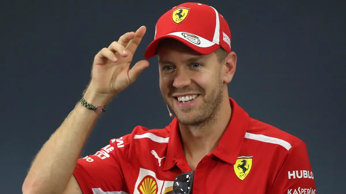 ARCHIV - 04.10.2018, Japan, Suzuka: Grand Prix von Japan auf dem Suzuka International Racing Course. Sebastian Vettel aus Deutschland vom Team Scuderia Ferrari spricht auf einer Pressekonferenz. (zu dpa «Sportstars an Weihnachten: Zwischen Leistungsdruck und Festlichkeit» am 21.12.2018) Foto: Ng Han Guan/AP/dpa +++ dpa-Bildfunk +++