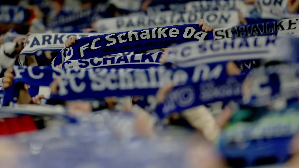 GELSENKIRCHEN, GERMANY - FEBRUARY 10: Fans of Schalke are seen during the Bundesliga match between FC Schalke 04 and VfL Wolfsburg at Veltins-Arena on February 10, 2023 in Gelsenkirchen, Germany. (Photo by Lars Baron/Getty Images)