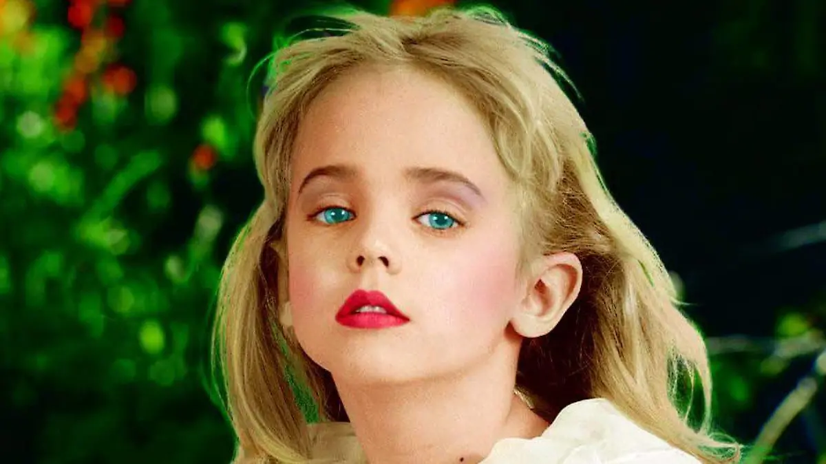 Jonbenet Ramsey, the murdered six-year-old from Boulder, Colorado, her mum Patsy who died earlier this year, and Jonbenet's brother Burke are pictured here in these intimate photos.Suspect John Mark Karr is currently being held after confessing that he was with Jonbenet when she died