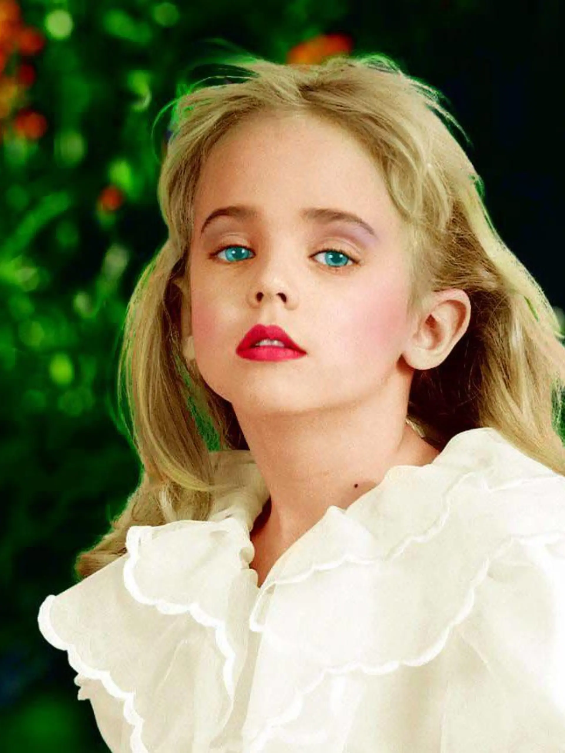 Jonbenet Ramsey, the murdered six-year-old from Boulder, Colorado, her mum Patsy who died earlier this year, and Jonbenet's brother Burke are pictured here in these intimate photos.Suspect John Mark Karr is currently being held after confessing that he was with Jonbenet when she died