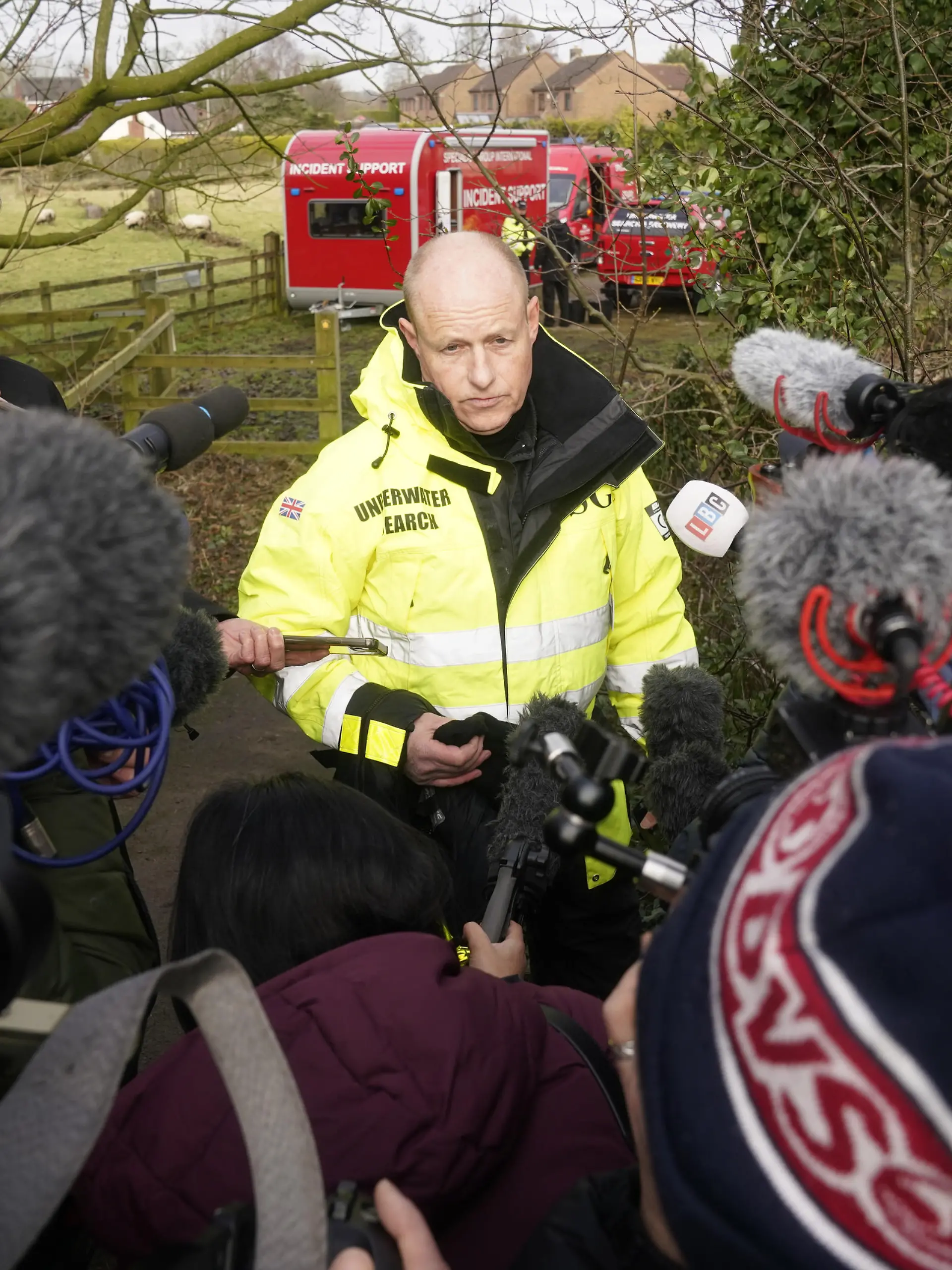 Nicola Bulley missing. Peter Faulding (centre) CEO of private underwater search and recovery company Specialist Group International (SGI), speaks to the media in St Michael's on Wyre, Lancashire, as police continue their search for missing woman Nicola Bulley, 45, who was last seen on the morning of Friday January 27, when she was spotted walking her dog on a footpath by the nearby River Wyre. Picture date: Monday February 6, 2023. See PA story POLICE Bulley. Photo credit should read: Danny Lawson/PA Wire URN:70886175
