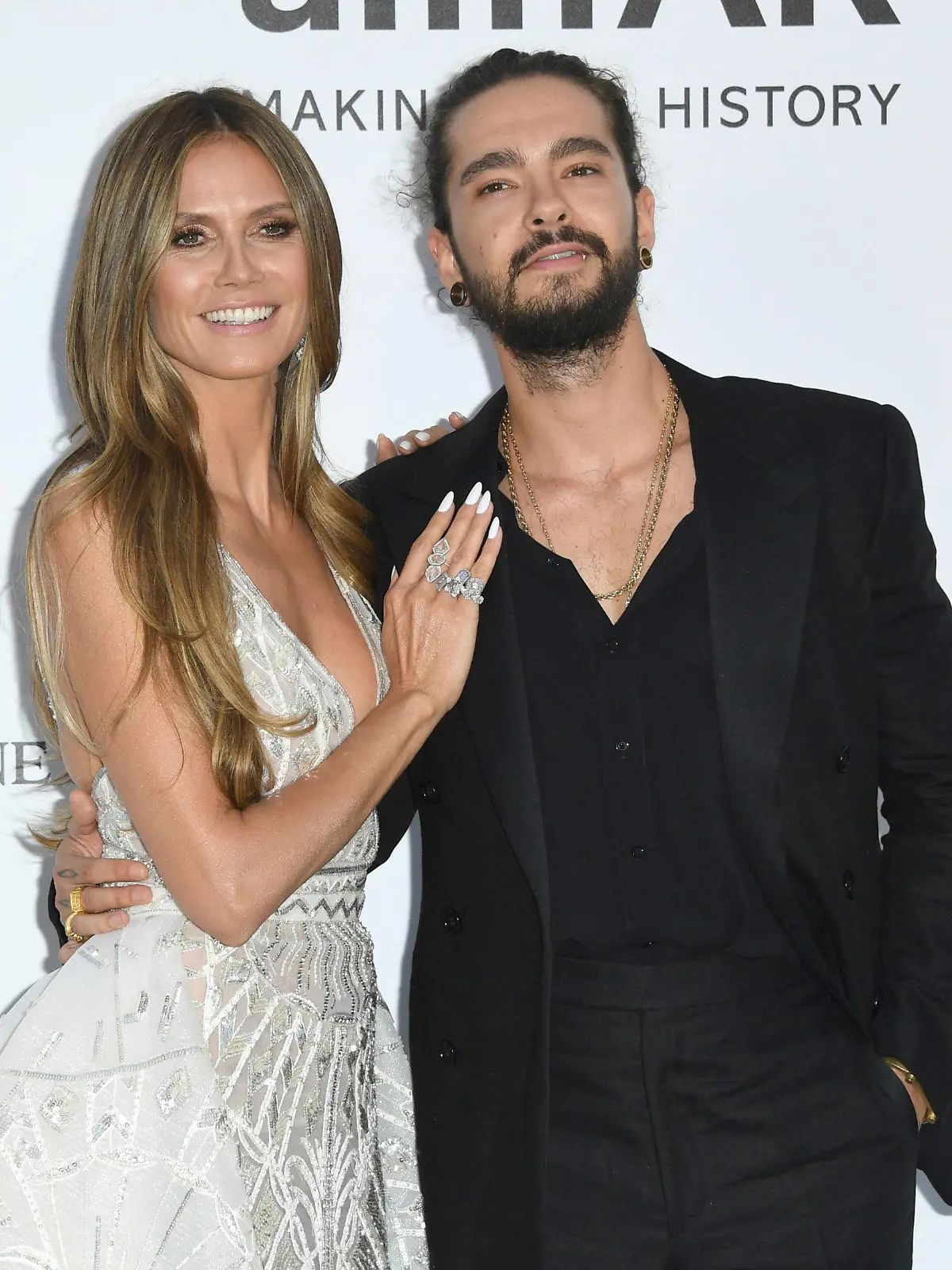 ARCHIV - 17.05.2018, Frankreich, Cannes: Heidi Klum, deutsches Model und TV-Star, und ihr Freund Tom Kaulitz, Gitarrist der Band Tokio Hotel, kommen zur amfAR-Benefiz-Veranstaltung «Cinema Against AIDS» im Rahmen des 71. Filmfestivals in Cannes. (zu dpa «Heidi Klum wundert sich über Altersdiskussion um Tom Kaulitz» vom 27.07.2018) Foto: Arthur Mola/Invision/AP/dpa +++ dpa-Bildfunk +++