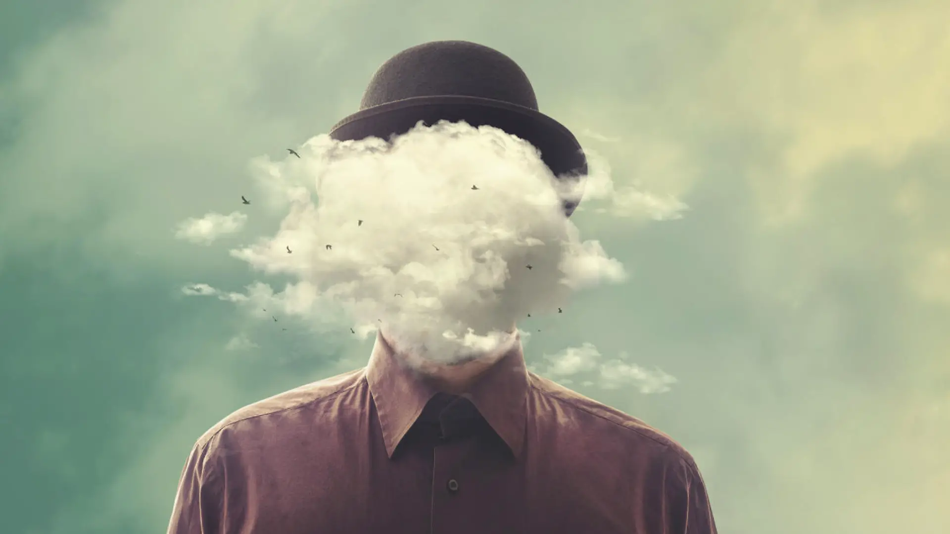 man with bowler with cloud over his head