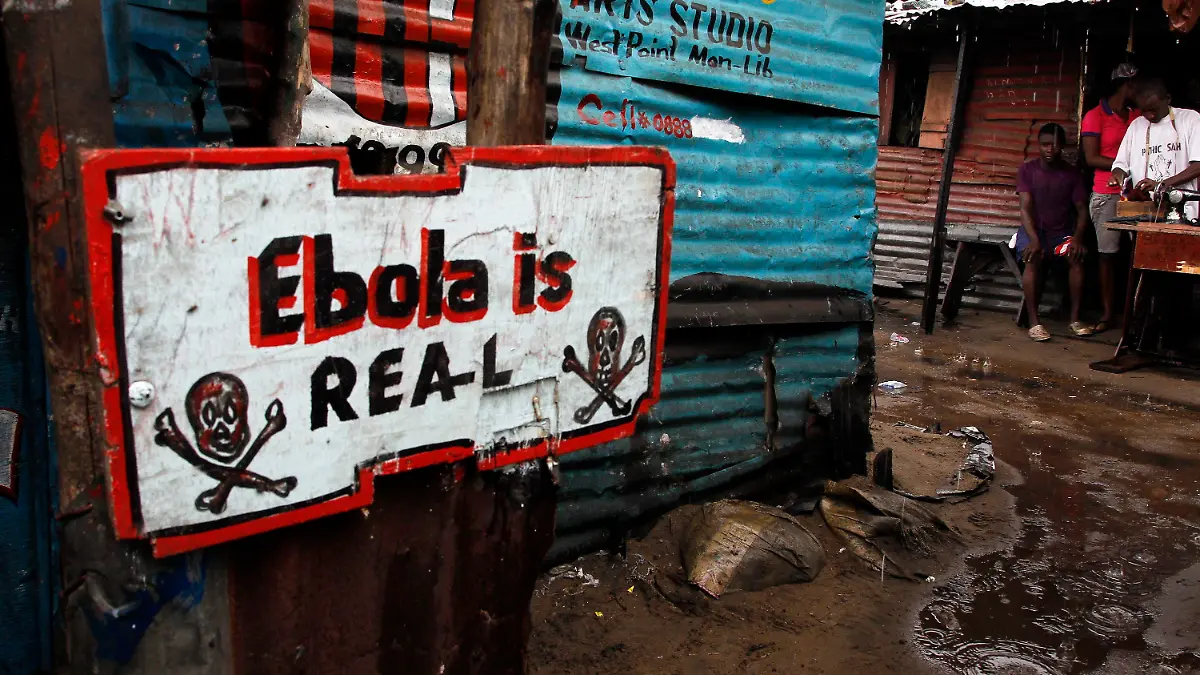 ARCHIV - An Ebola sign placed infront of a home in West Point slum area of Monrovia, Liberia, 25 September 2014. EPA/AHMED JALLANZO (zu dpa "Ebola-Impfstoffe in Liberia erfolgreich getestet" vom 27.03.2015) +++(c) dpa - Bildfunk+++