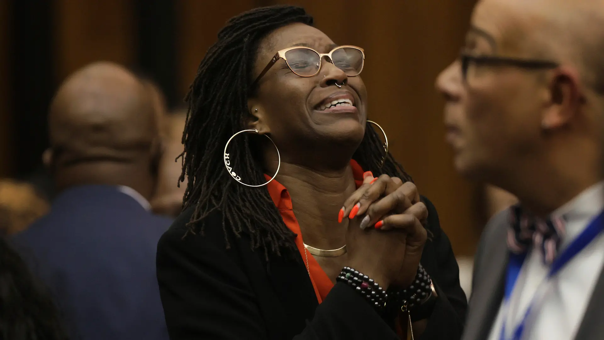 Erika Barrow, former girlfriend to Lamar Johnson, reacts on Tuesday, Feb. 14, 2023, after St. Louis Circuit Judge David Mason vacated his murder conviction during a hearing in St. Louis, Mo. Johnson served nearly 28 years of a life sentence for a killing that he has always said he didn't commit. (Christian Gooden/St. Louis Post-Dispatch via AP, Pool)