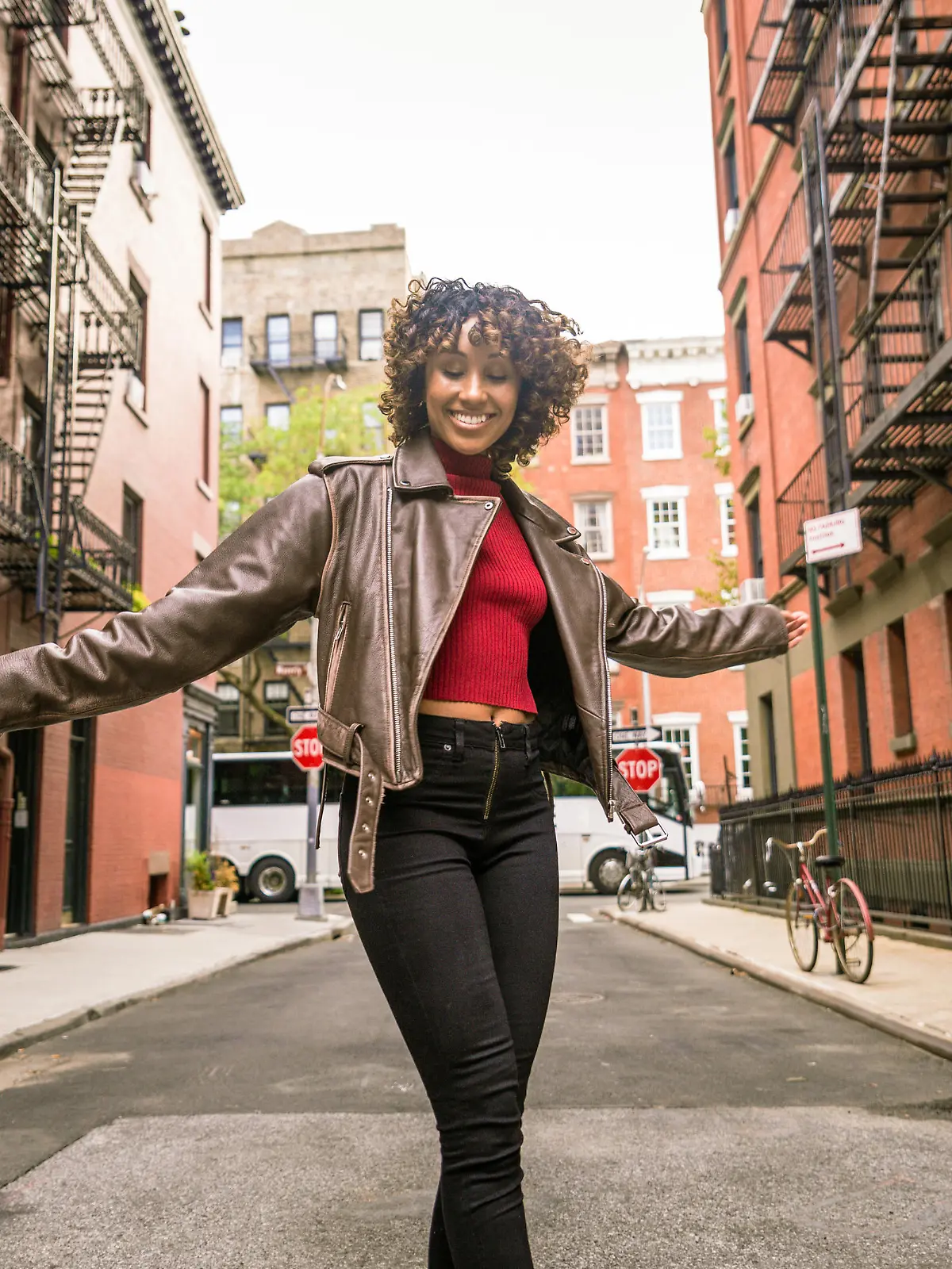 Happy african american woman smiling. Beautiful young femal walking and having fun in New York city