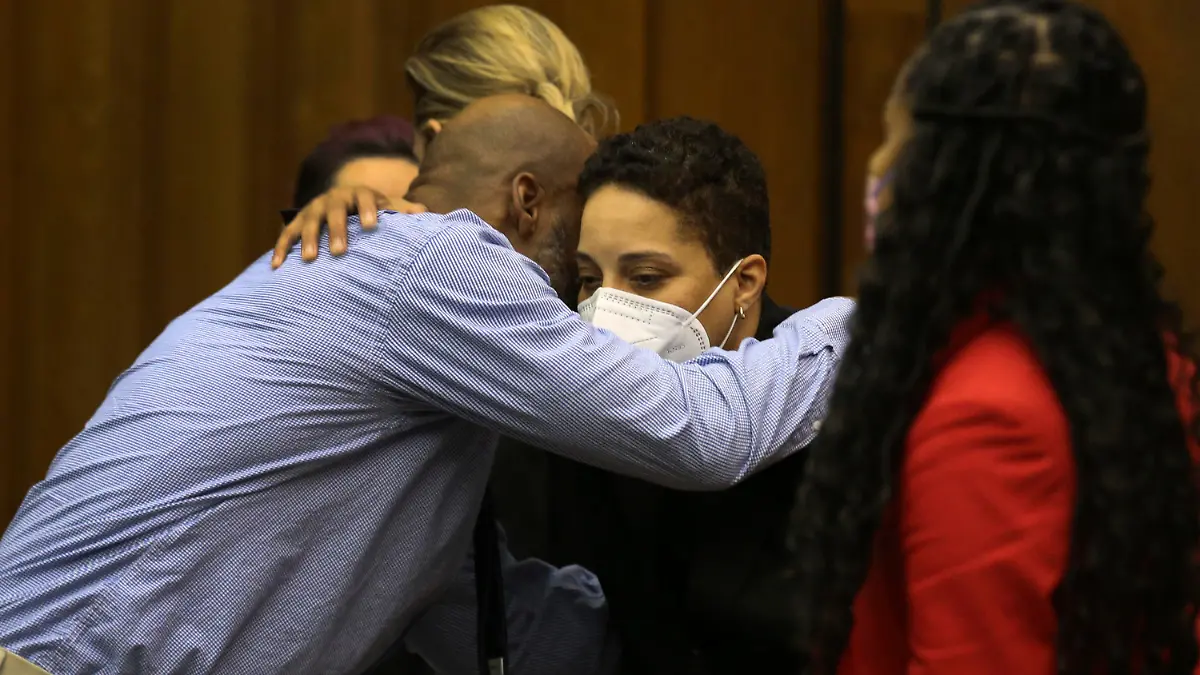 Lamar Johnson, left, embraces St. Louis Prosecutor Kim Garner on Tuesday, Feb. 14, 2023, after St. Louis Circuit Judge David Mason vacated his murder conviction during a hearing in St. Louis, Mo. Johnson served nearly 28 years of a life sentence for a killing that he has always said he didn't commit. (Christian Gooden/St. Louis Post-Dispatch via AP, Pool)