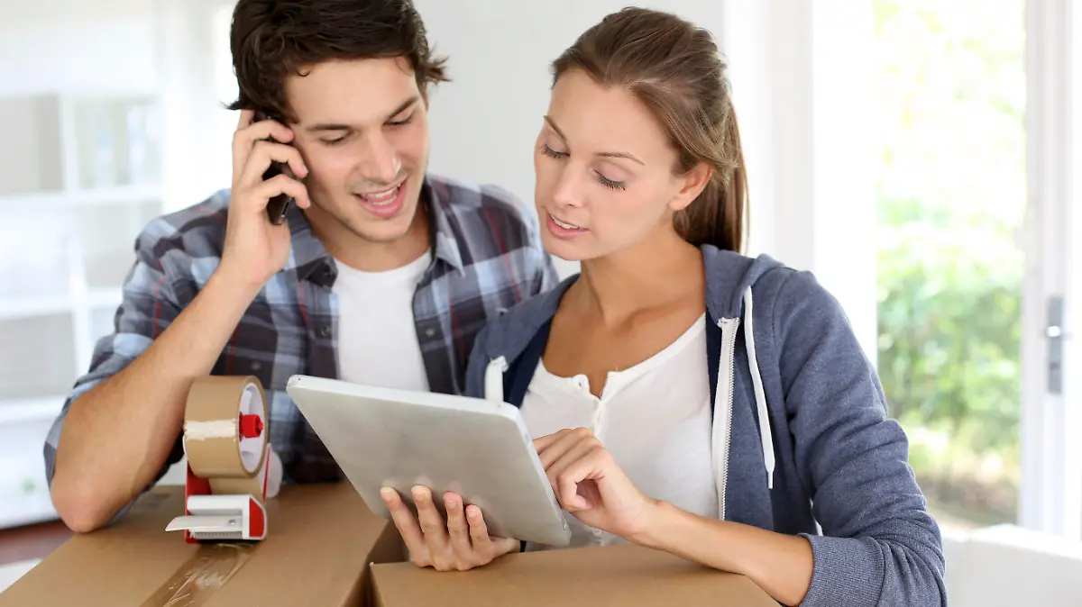 Couple calling transport company to move in new house