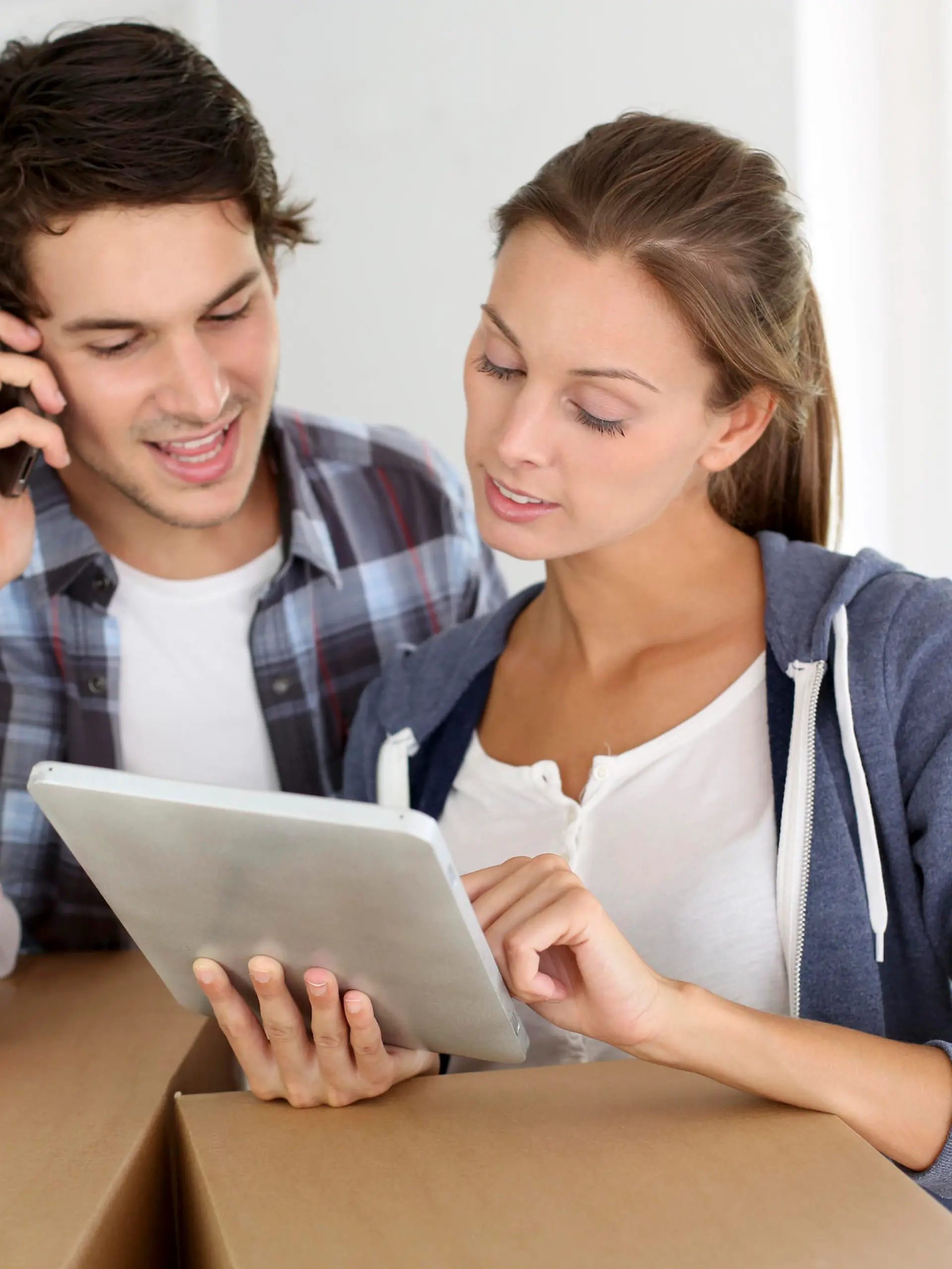 Couple calling transport company to move in new house