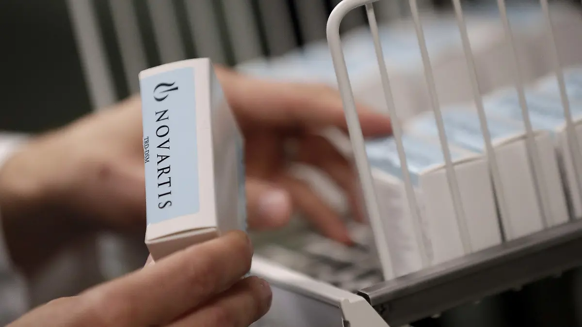 A Novartis-labeled box is cataloged prior to testing procedures Tuesday, Aug. 14, 2018 at Banner Alzheimers Institute in Phoenix. Novartis and Amgen are making of two experimental drugs being tested to try to prevent Alzheimers while memory and thinking skills are still intact. (AP Photo/Matt York) |