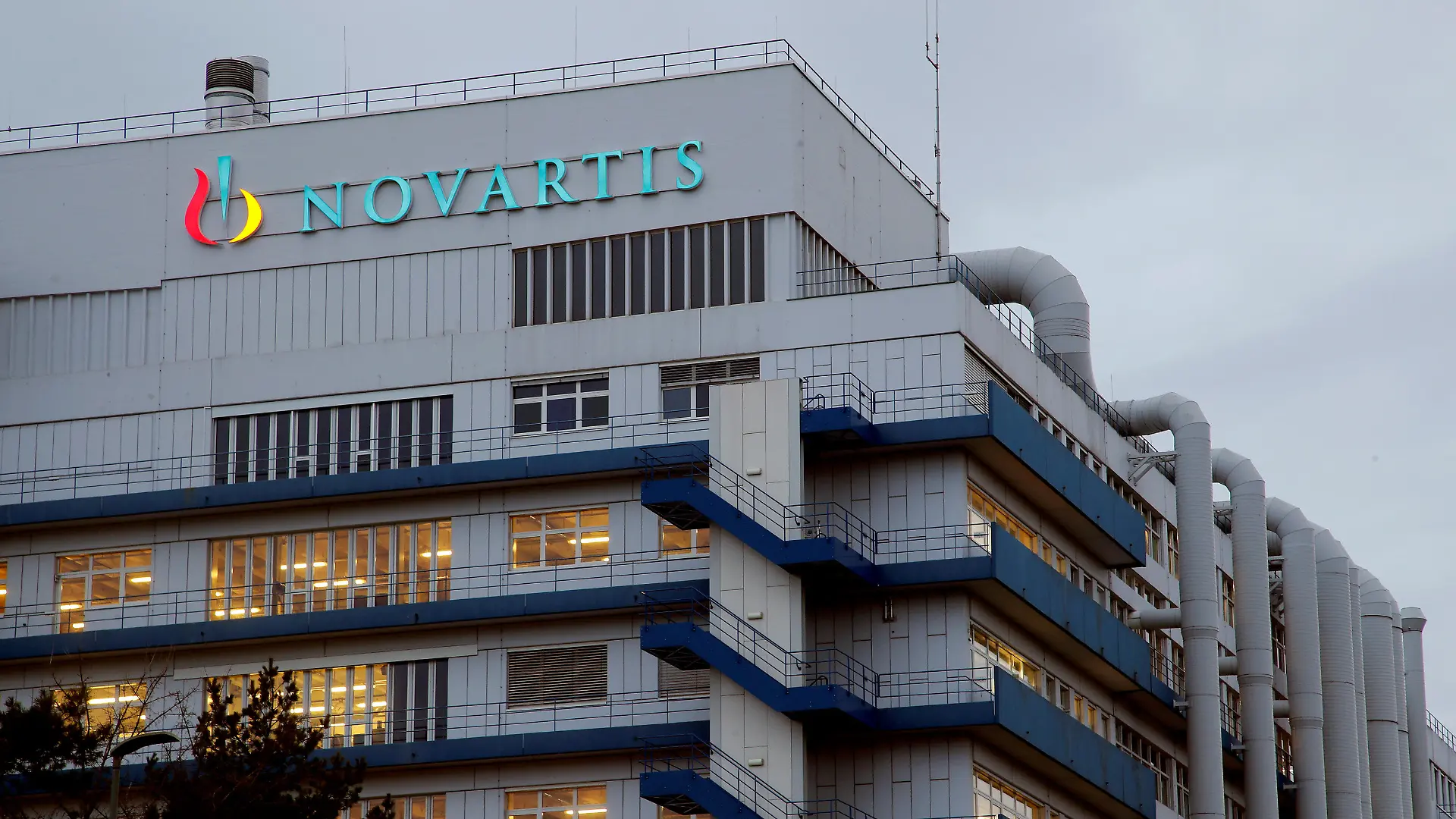 FILE PHOTO: Logo of Swiss drugmaker Novartis is seen at its branch in Schweizerhalle near Basel, Switzerland, March 29, 2018. REUTERS/Arnd Wiegmann/File Photo GLOBAL BUSINESS WEEK AHEAD