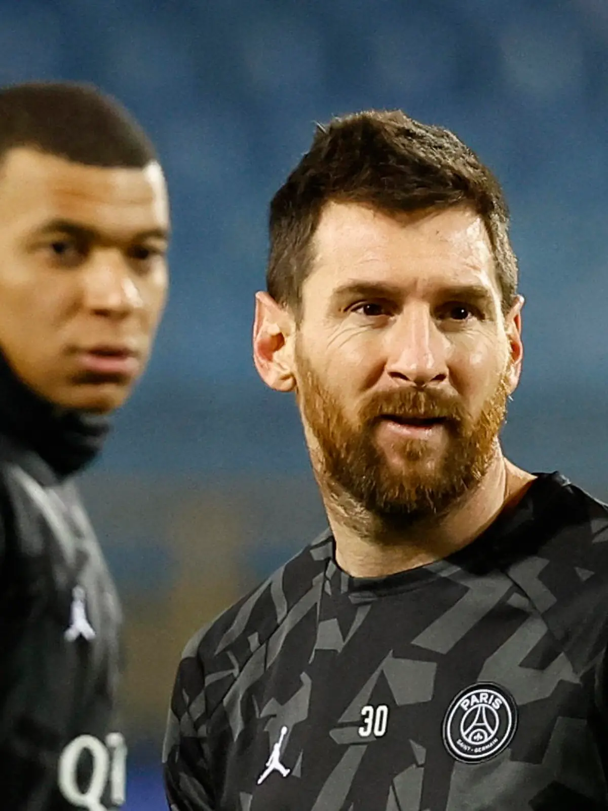Soccer Football - Ligue 1 - Montpellier v Paris St Germain - Stade de la Mosson, Montpellier, France - February 1, 2023 Paris St Germain's Kylian Mbappe and Lionel Messi during the warm up REUTERS/Eric Gaillard