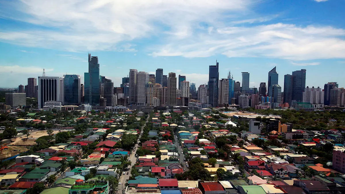 FILE PHOTO: A general view of the skyline from the Makati City Hall in Manila, Philippines, May 11, 2010.   To match Special Report CYBER-HEIST/FEDERAL     REUTERS/Nicky Loh/File Photo/File Photo