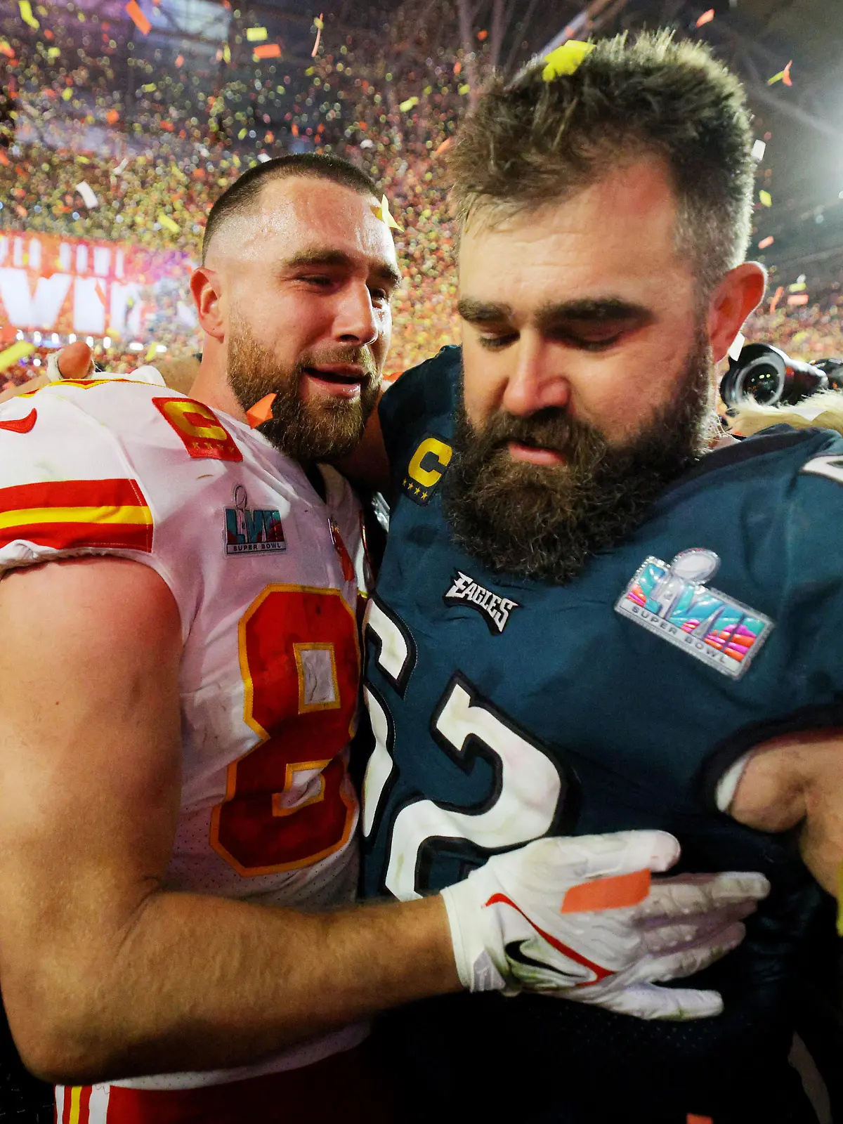Football - NFL - Super Bowl LVII - Kansas City Chiefs v Philadelphia Eagles - State Farm Stadium, Glendale, Arizona, United States - February 12, 2023 Kansas City Chiefs' Travis Kelce with his brother, Philadelphia Eagles' Jason Kelce as the Kansas City Chiefs celebrate after winning Super Bowl LVII REUTERS/Brian Snyder