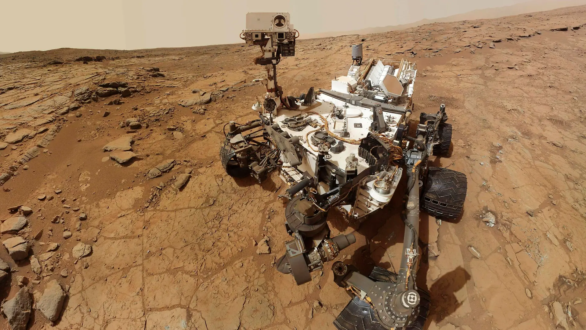 NASA's Mars rover Curiosity is pictured in this February 3, 2013 handout self-portrait. A computer glitch, possibly caused by radiation, has put on hold the Mars rover Curiosity's first attempt to analyze powder from inside an ancient rock, officials said on March 4, 2013. REUTERS/NASA/Handout. (UNITED STATES - Tags: SCIENCE TECHNOLOGY) FOR EDITORIAL USE ONLY. NOT FOR SALE FOR MARKETING OR ADVERTISING CAMPAIGNS. THIS PICTURE WAS PROCESSED BY REUTERS TO ENHANCE QUALITY. AN UNPROCESSED VERSION WILL BE PROVIDED SEPARATELY