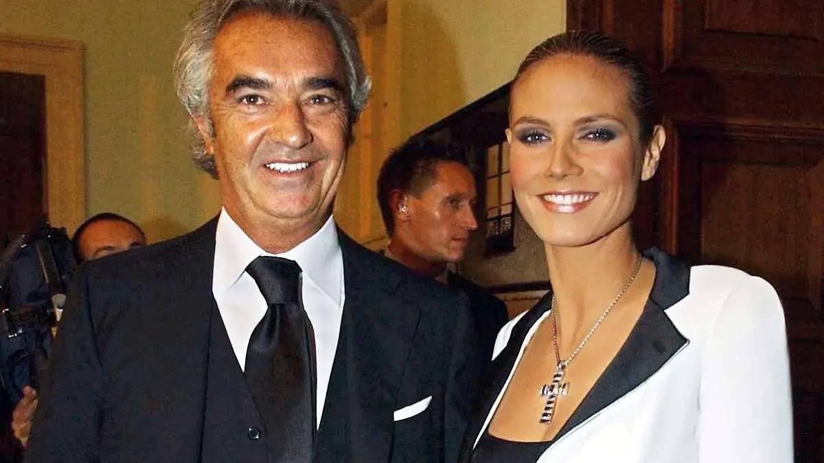 Archivfoto vom 21.10.2003: Das deutsche Top-Model Heidi Klum (r) und ihr italienischer Freund, Formel-1-Teamchef Flavio Briatore, aufgenommen auf einer Benefizgala im Berliner Schloss Bellevue. Das Paar lässt am 16. Dezember 2003 in London mitteilen, das es im Frühling nächsten Jahres Nachwuchs erwartet.