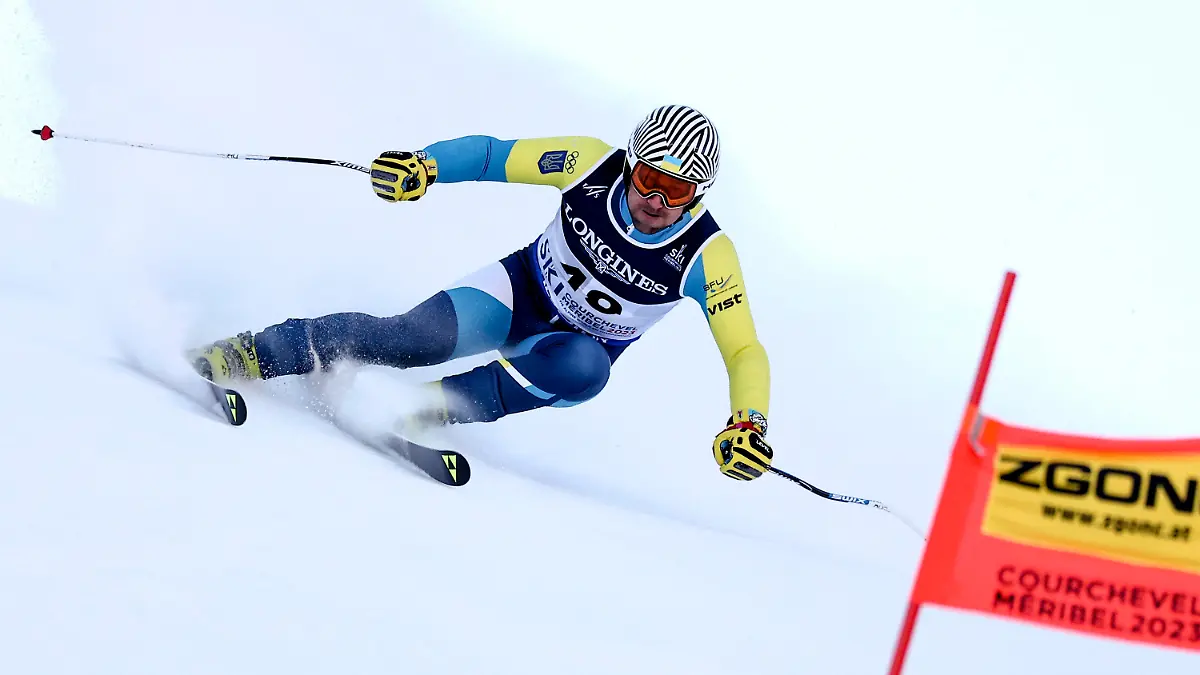 Ukraine's Ivan Kovbasnyuk speeds down the course during the super G portion of an alpine ski, men's World Championship combined race, in Courchevel, France, Tuesday, Feb. 7, 2023. (AP Photo/Gabriele Facciotti)
