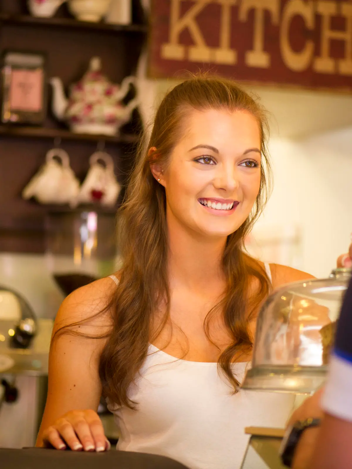 young woman working in a coffee shop