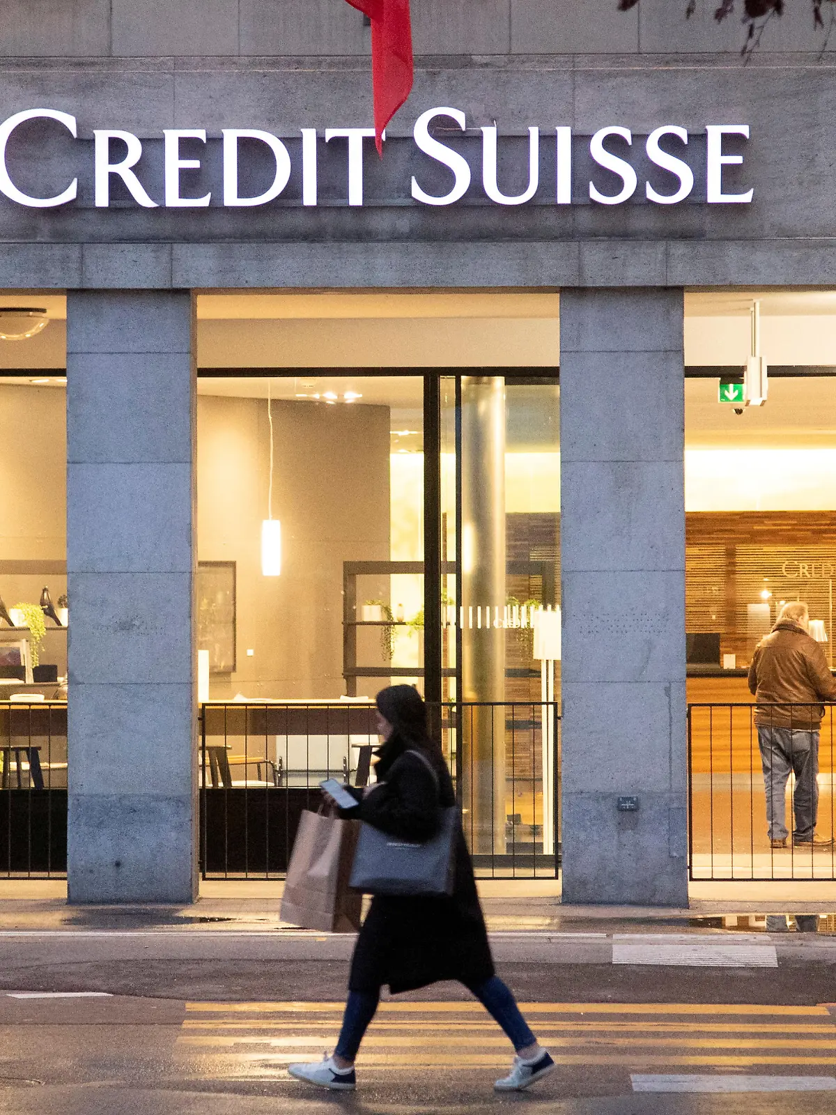 FILE PHOTO: The logo of Swiss bank Credit Suisse is seen in front of a branch office in Bern, Switzerland November 29, 2022. REUTERS/Arnd Wiegmann/File Photo