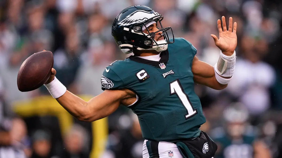 FILE - Philadelphia Eagles quarterback Jalen Hurts passes during the first half of the NFC Championship NFL football game between the Philadelphia Eagles and the San Francisco 49ers on Sunday, Jan. 29, 2023, in Philadelphia. The Chiefs and Eagles are bringing MVP finalists Patrick Mahomes and Jalen Hurts to the Super Bowl to cap a season in which the NFL had a glaring amount of instability at quarterback. (AP Photo/Matt Rourke, File)