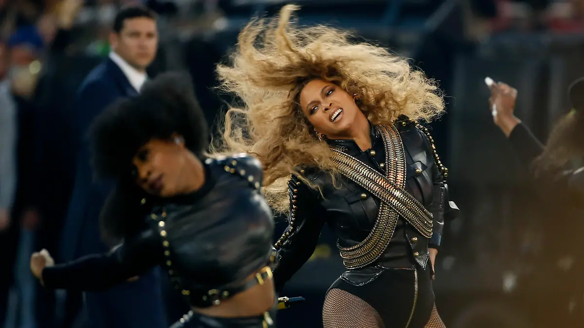 FILE - In this Sunday, Feb. 7, 2016, file photo, Beyonce performs during halftime of the NFL Super Bowl 50 football game in Santa Clara, Calif. Beyonce has helped raise more than $82,000 for Flint residents who continue to deal with the city's lead-tainted water supply. The singer's representatives announced her entertainment and management company, Parkwood Entertainment, presented the United Way of Genesee County with a check for $82,234 on Monday, June 13, 2016. (AP Photo/Matt Slocum, File)