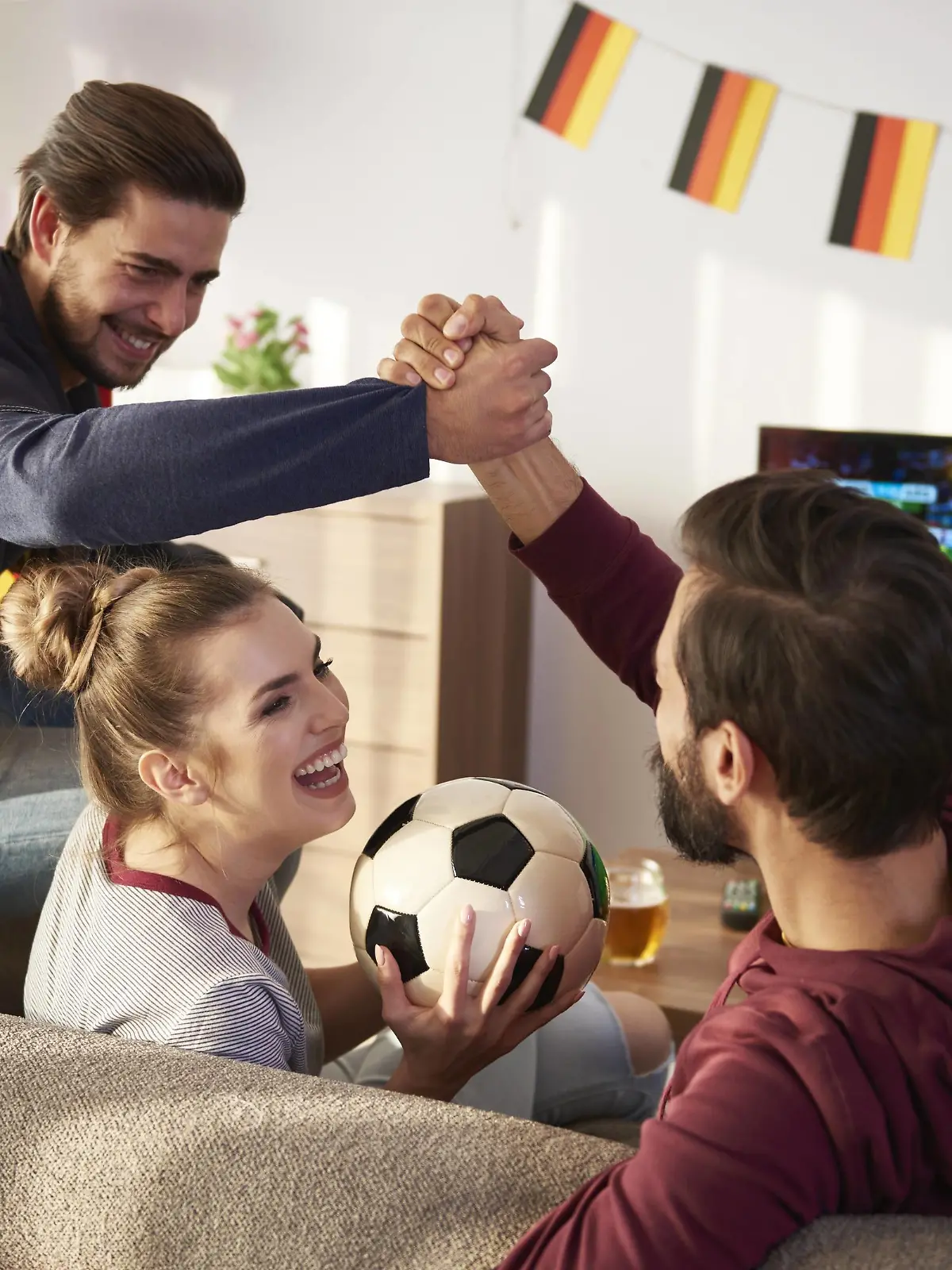 German football fans watching Tv and cheering model released Symbolfoto property released PUBLICATIONxINxGERxSUIxAUTxHUNxONLY ABIF00083  