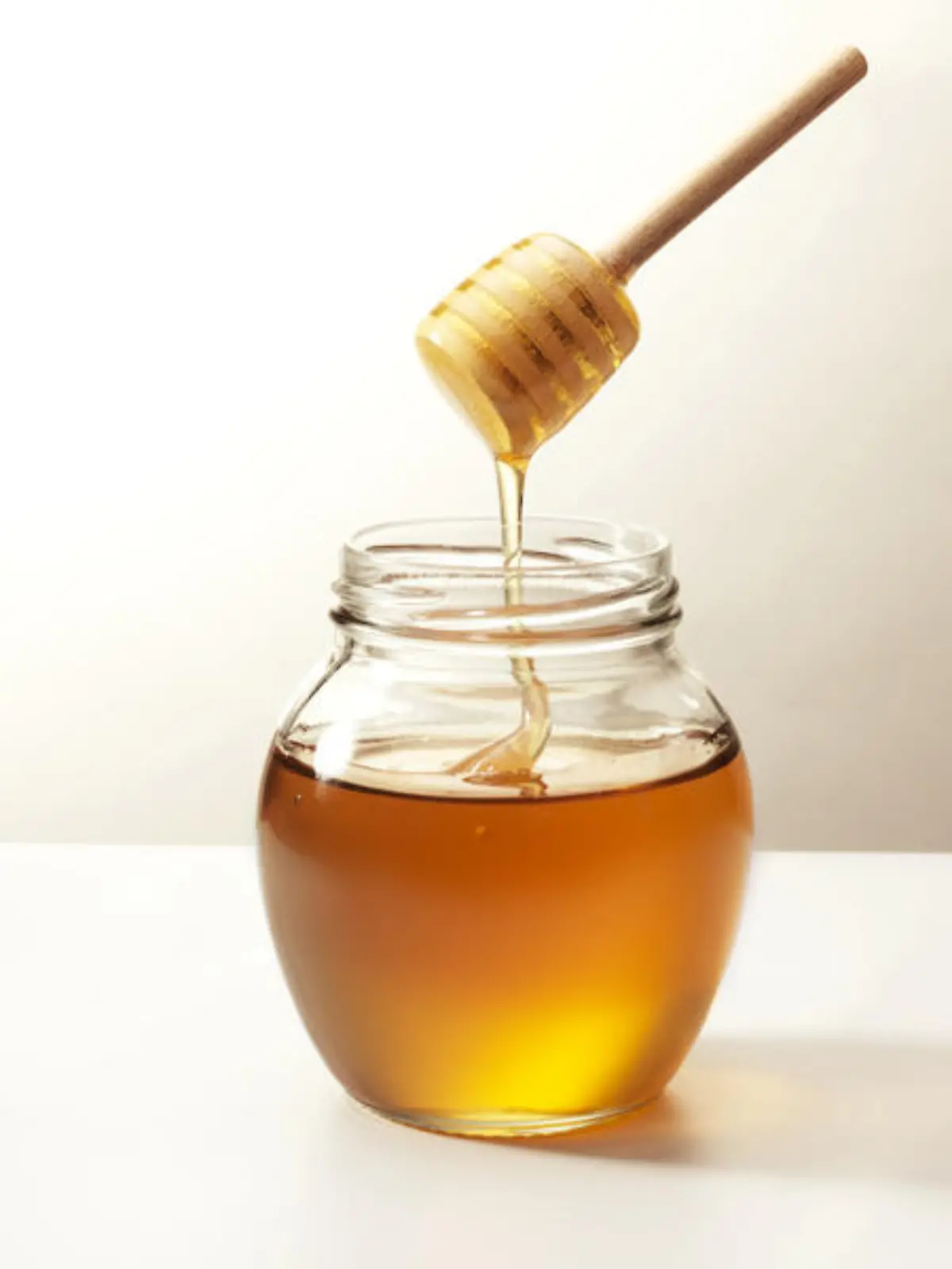 Warm honey in a stick