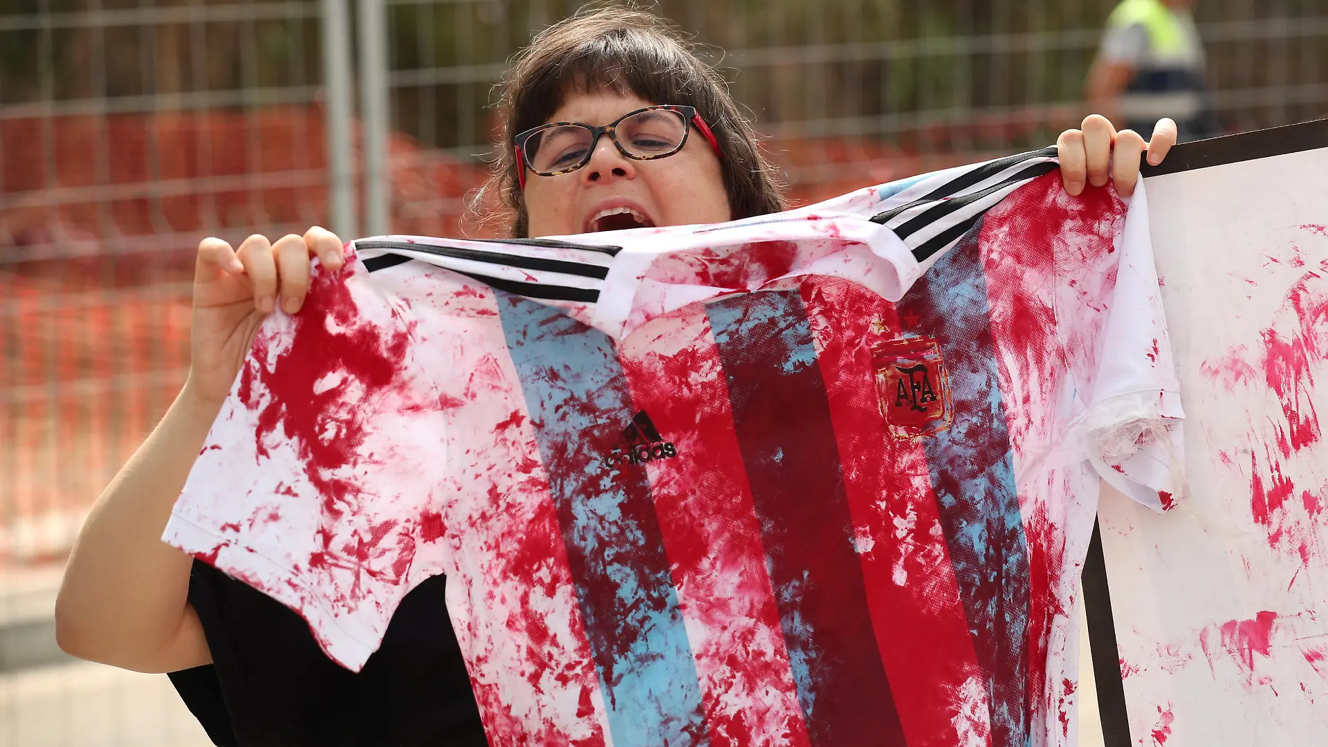 Soccer Football - FIFA World Cup - Argentina Training - Ciutat Esportiva Joan Gamper, Barcelona, Spain - June 5, 2018   Protestors outside the training session   REUTERS/Albert Gea