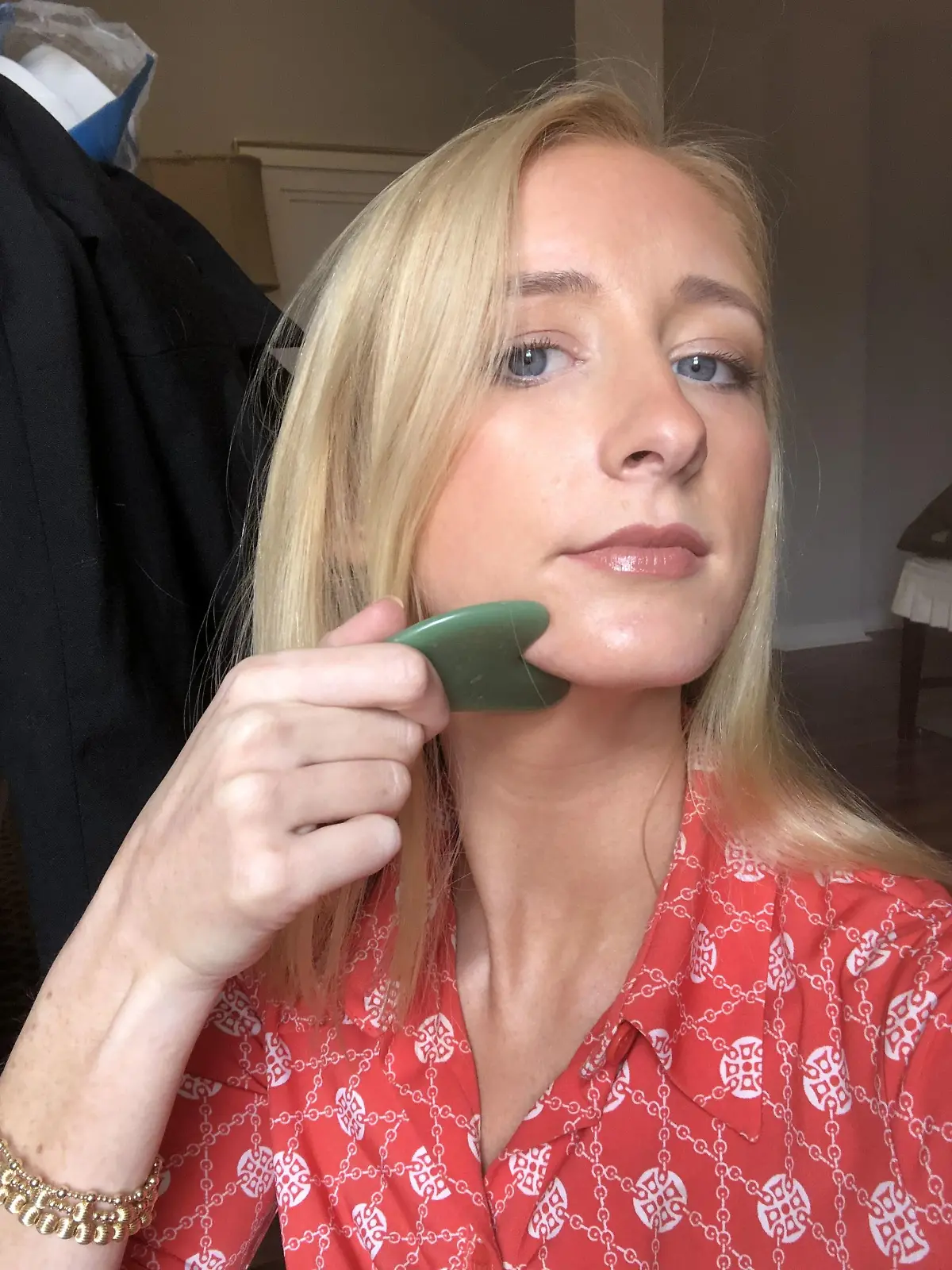 PIC FROM Kennedy News and Media (PICTURED: Helen Bender, 26, from Mobile Alabama, who discovered a lump which turned out to be stage IV melanoma, after using viral TikTok beauty tool, a gua shua, to massage her jawline) An estate agent claims a viral TikTok beauty massage hack saved her life - after discovering a lump on her neck that turned out to be CANCER. Helen Bender was using a popular gua shua massage tool on her face in a bid to sculpt a 'skinnier' jawline and soothe her neck muscles in April 2022, when she first felt the bump under her skin. Unfazed, the 26-year-old believed it to be a swollen lymph node caused by her being run down with a cold. DISCLAIMER: While Kennedy News and Media uses its best endeavours to establish the copyright and authenticity of all pictures supplied, it accepts no liability for any damage, loss or legal action caused by the use of images supplied and the publication of images is solely at your discretion. SEE KENNEDY NEWS COPY - 0161 697 4266