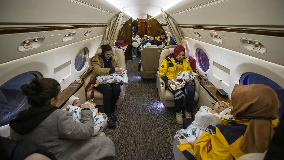 KAHRAMANMARAS, TURKIYE - FEBRUARY 08: Babies rescued from the rubble of collapsed buildings in Kahramanmaras are being transferred to Ankara by Turkish Presidential Plane after 7.7 and 7.6 magnitude earthquakes hit Turkiye's multiple provinces on February 8, 2023. 16 babies, left unaccompanied due to earthquake transferred to Ankara for care. Early Monday morning, a strong 7.7 earthquake, centered in the Pazarcik district, jolted Kahramanmaras and strongly shook several provinces, including Gaziantep, Kahramanmaras, Diyarbakir, Adana, Adiyaman, Malatya, Osmaniye, Hatay, and Kilis. Later, at 13.24 p.m. (1024GMT), a 7.6 magnitude quake centered in Kahramanmaras' Elbistan district struck the region. Turkiye declared 7 days of national mourning after deadly earthquakes in southern provinces. Mehmet Ali Ozcan / Anadolu Agency