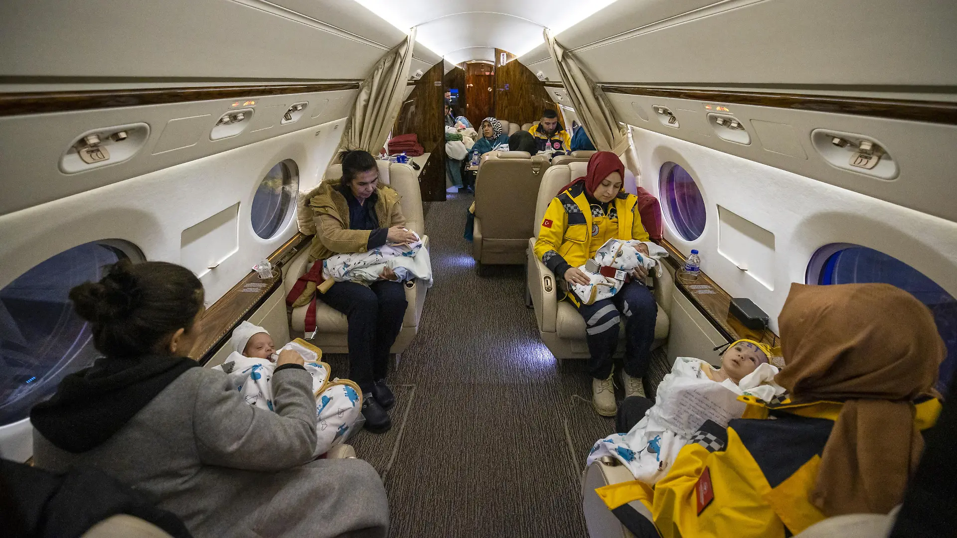 KAHRAMANMARAS, TURKIYE - FEBRUARY 08: Babies rescued from the rubble of collapsed buildings in Kahramanmaras are being transferred to Ankara by Turkish Presidential Plane after 7.7 and 7.6 magnitude earthquakes hit Turkiye's multiple provinces on February 8, 2023. 16 babies, left unaccompanied due to earthquake transferred to Ankara for care. Early Monday morning, a strong 7.7 earthquake, centered in the Pazarcik district, jolted Kahramanmaras and strongly shook several provinces, including Gaziantep, Kahramanmaras, Diyarbakir, Adana, Adiyaman, Malatya, Osmaniye, Hatay, and Kilis. Later, at 13.24 p.m. (1024GMT), a 7.6 magnitude quake centered in Kahramanmaras' Elbistan district struck the region. Turkiye declared 7 days of national mourning after deadly earthquakes in southern provinces. Mehmet Ali Ozcan / Anadolu Agency