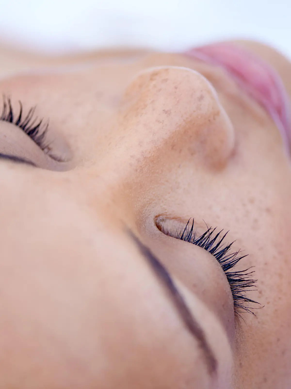 Cropped shot of an attractive young woman lying on her back