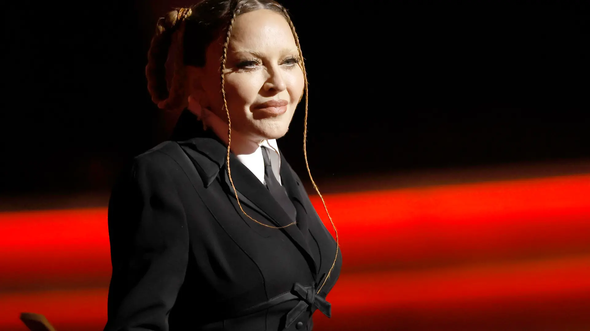 LOS ANGELES, CALIFORNIA - FEBRUARY 05: Madonna speaks onstage during the 65th GRAMMY Awards at Crypto.com Arena on February 05, 2023 in Los Angeles, California. (Photo by Kevin Winter/Getty Images for The Recording Academy )