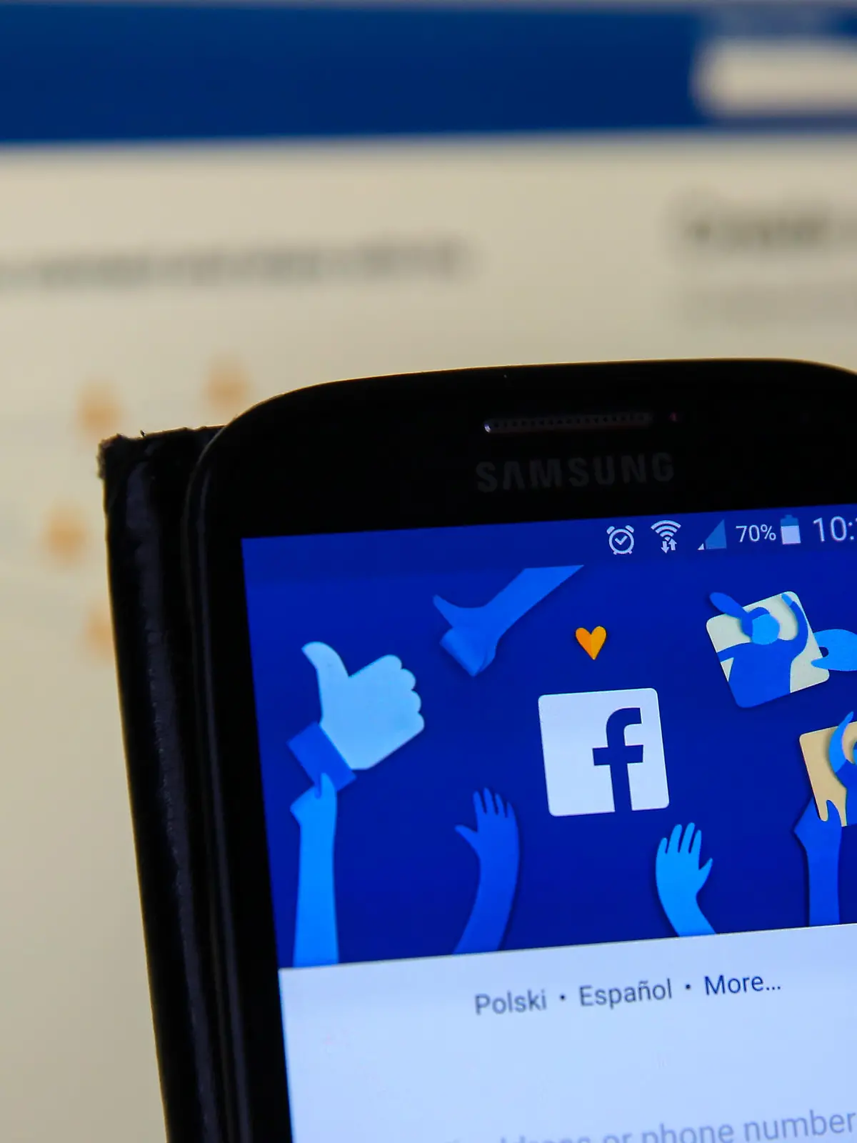 A user using Facebook on mobile phone and desktop. 
According to Facebook, from Monday 9 April 2018 its users will receive a notice on their feeds, titled 'Protecting Your Information' with a link to see what apps they use and what information they have shared with those apps. In addition, the 87 million users who might have had their data shared with Cambridge Analytica will get a more detailed message informing them of this. 

Featuring: Atmosphere, View
Where: London, United Kingdom
When: 08 Apr 2018
Credit: Dinendra Haria/WENN