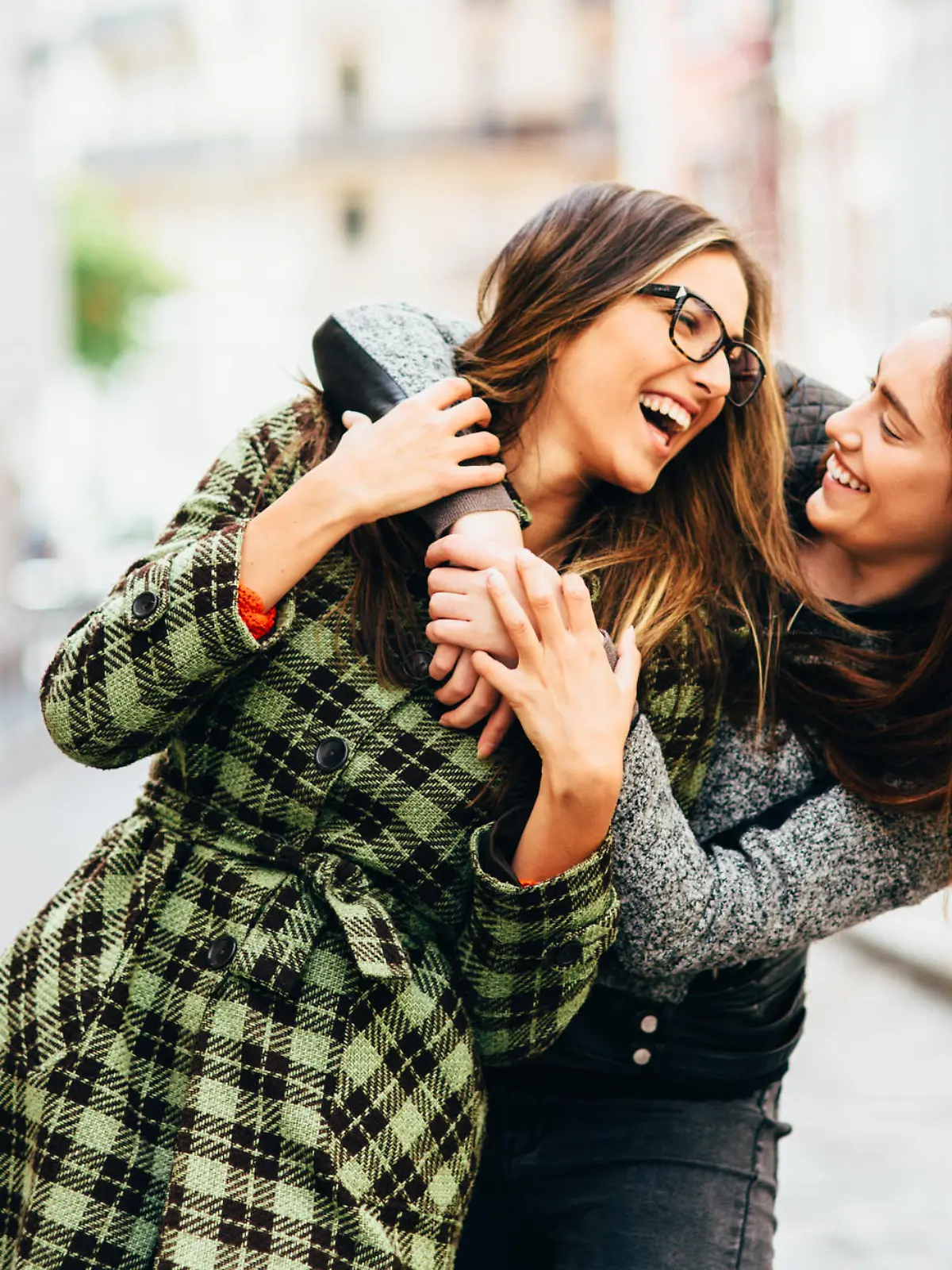 Two friends having fun in Paris, France.