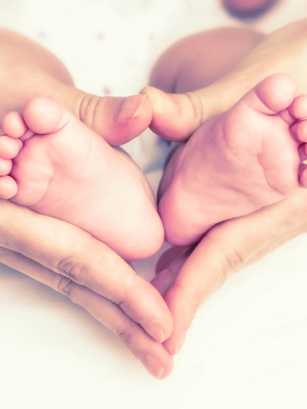 Baby feet in the mother hands